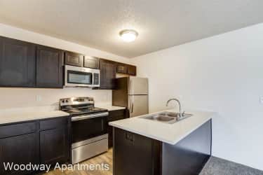 Kitchen - Woodway Apartments - Manhattan, KS