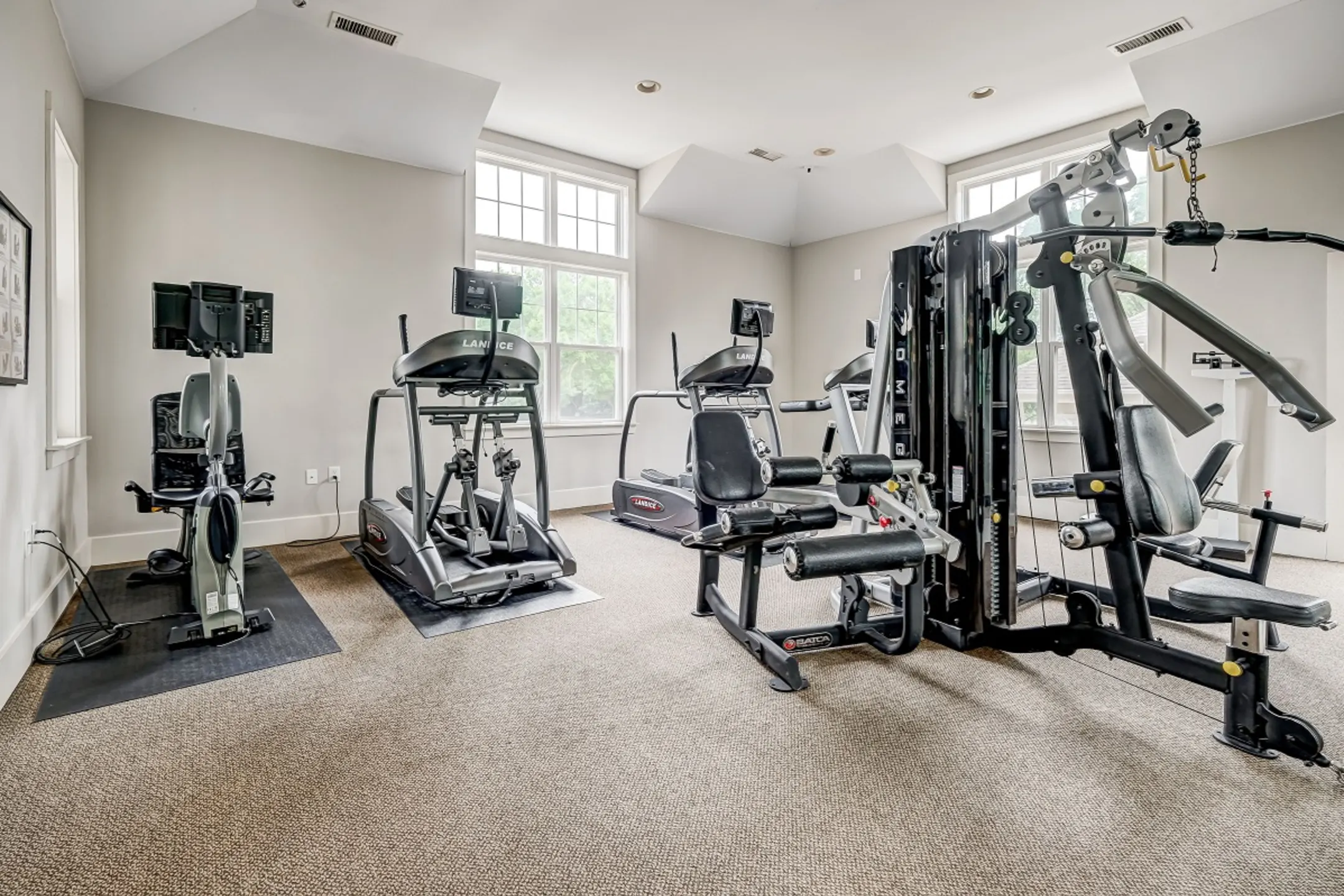 Fitness Weight Room - Falls Creek Apartments & Townhomes - Raleigh, NC