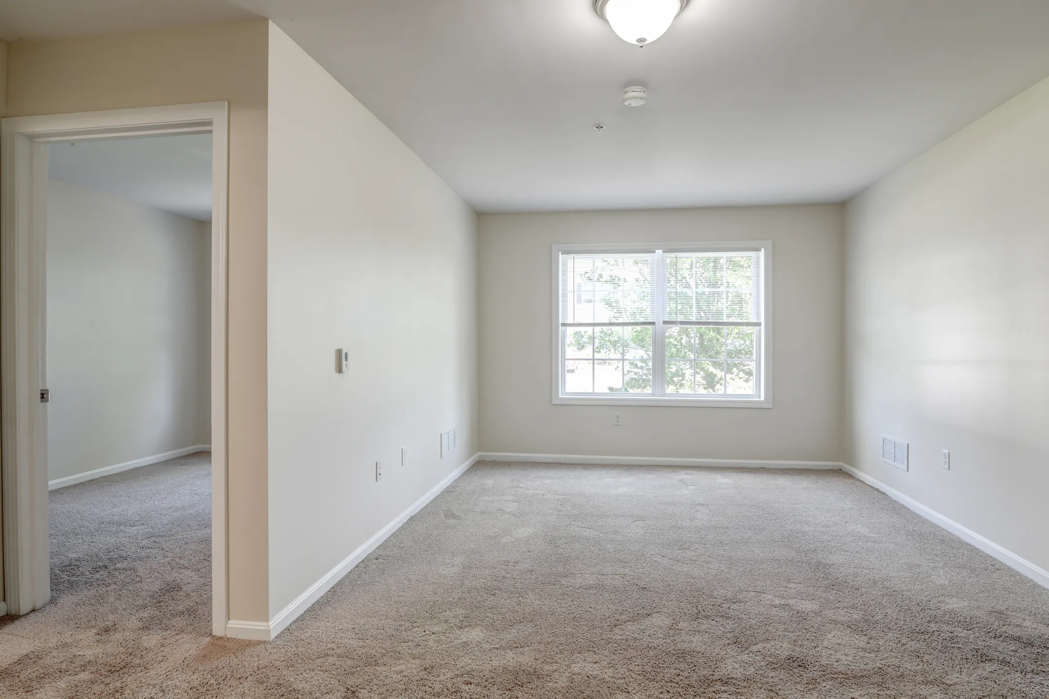 Living Room - Redstone Apartments and Single Family Homes - Manchester, NH