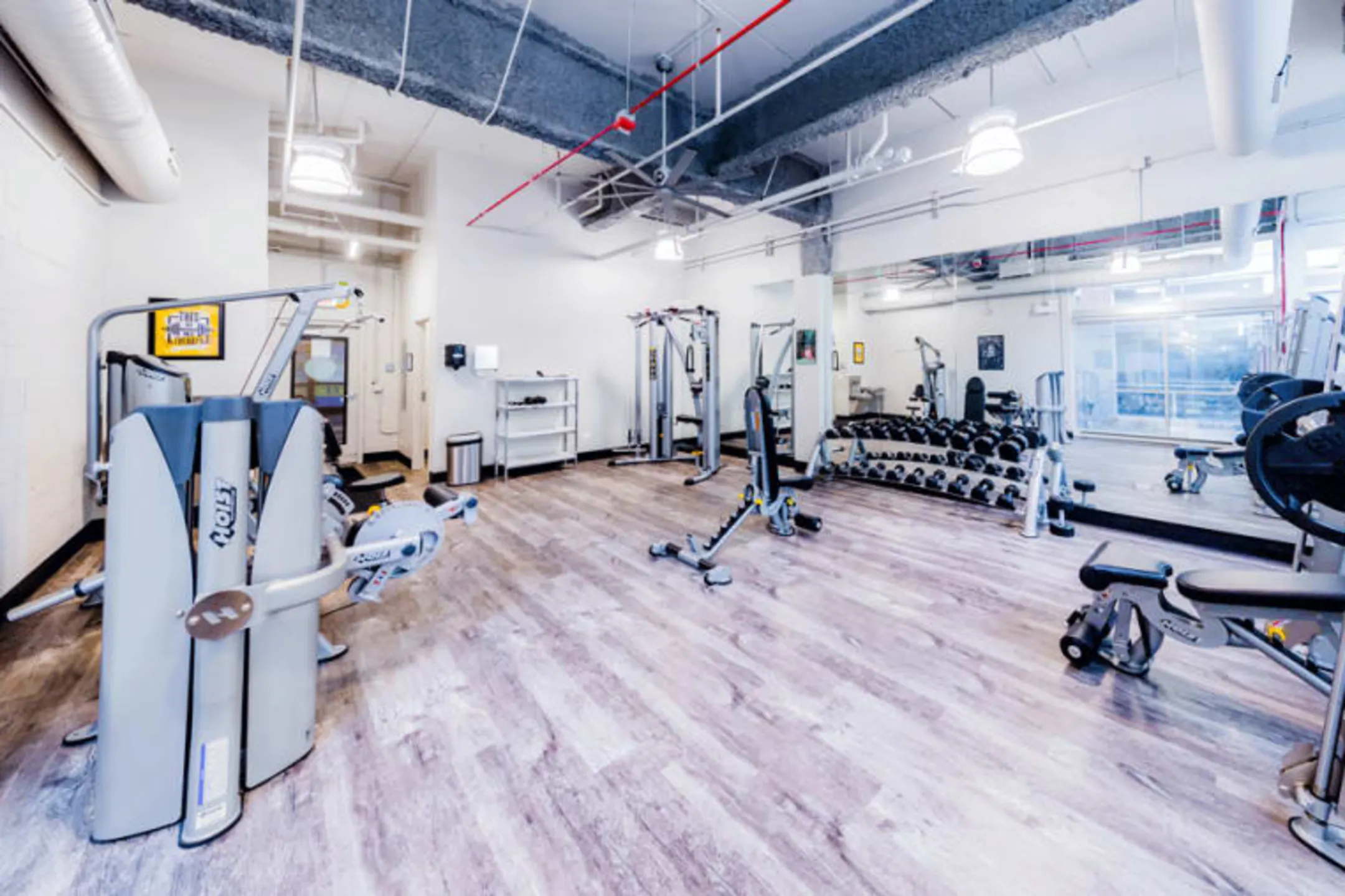Fitness Weight Room - Wells Place Luxury Apartments - Chicago, IL