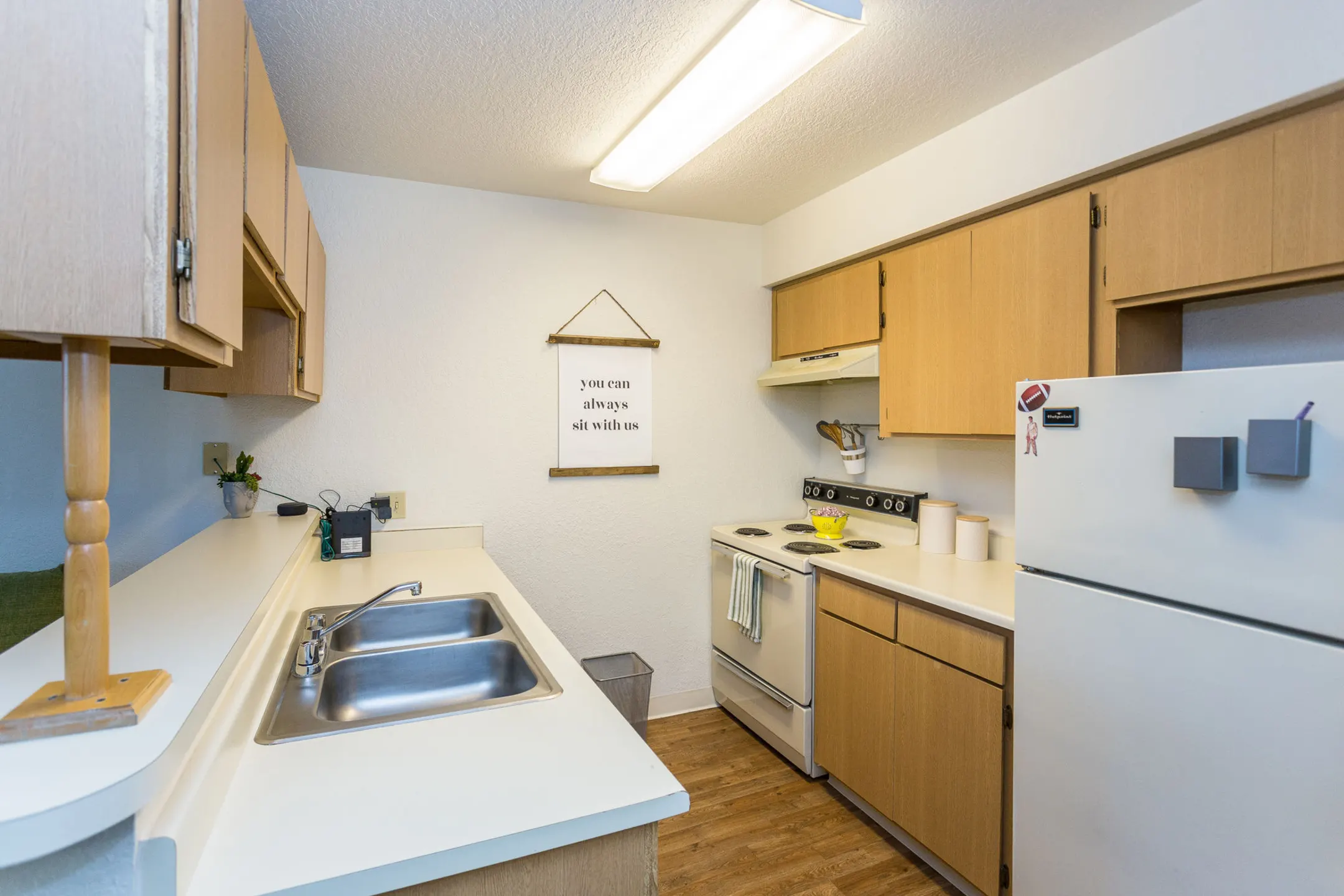 Kitchen - Woodlands Village Apartments - Flagstaff, AZ