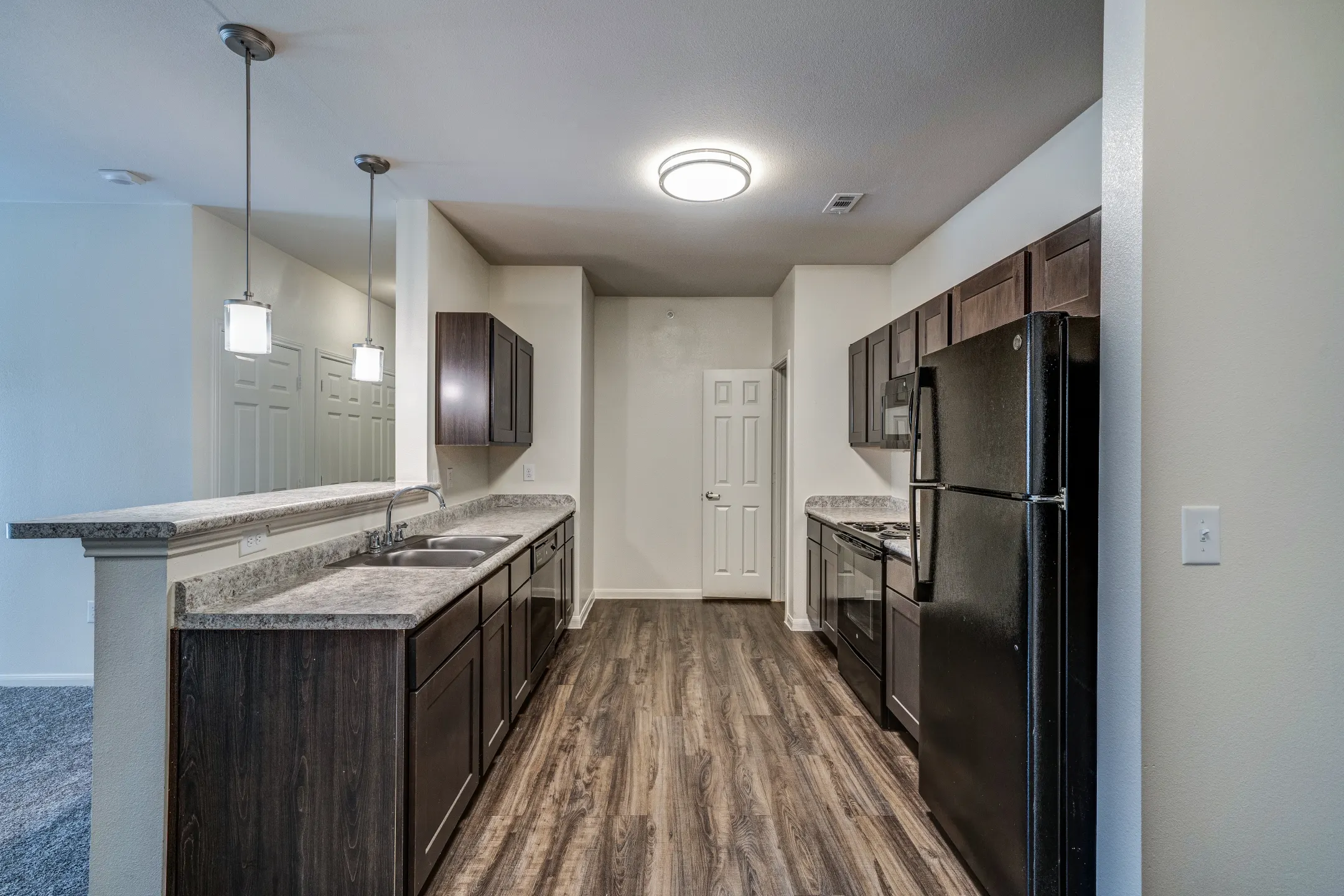 Kitchen - Trails at Leon Creek Apartment Homes - San Antonio, TX