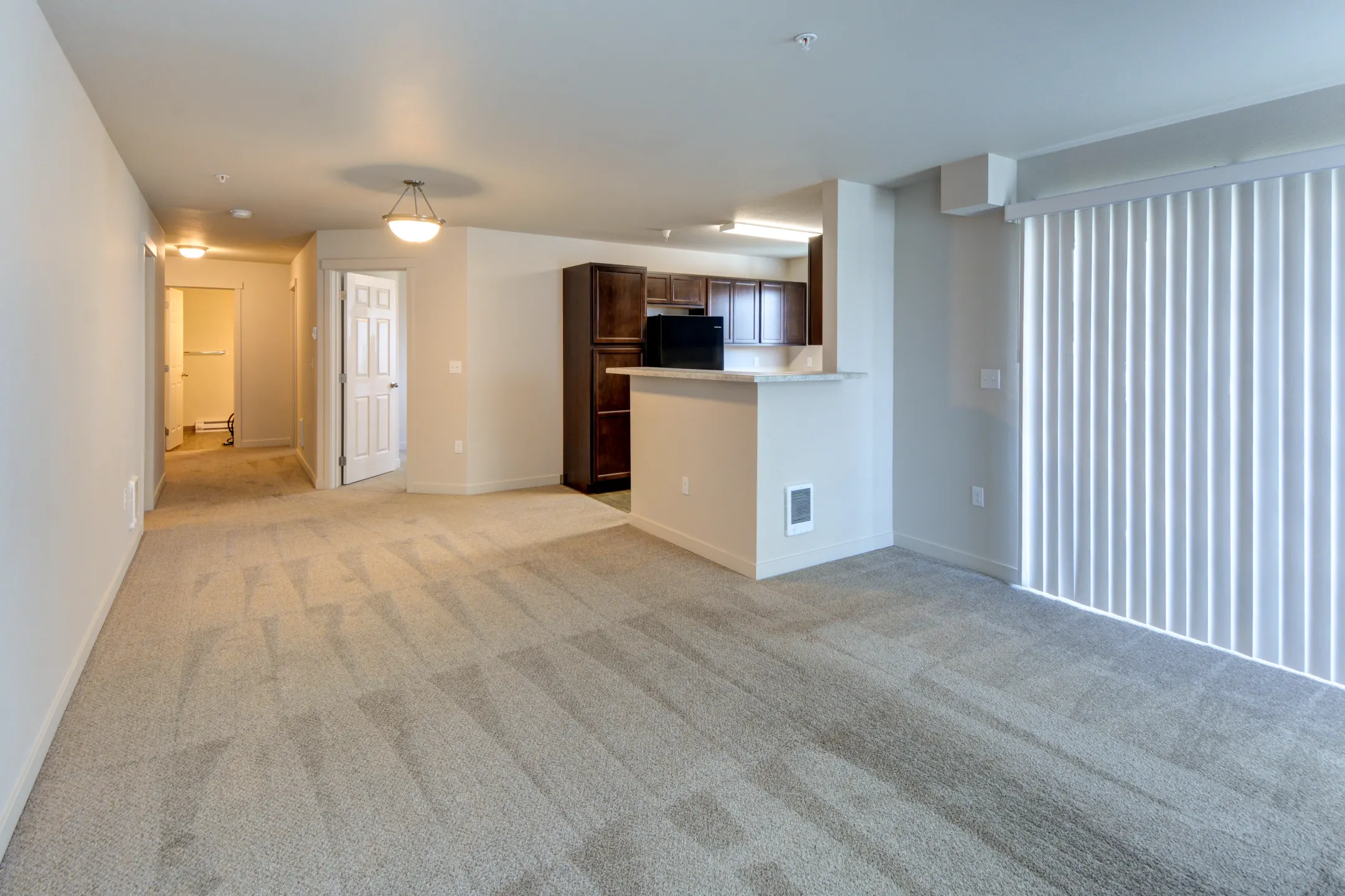 Living Room - Crown Pointe Apartments - Post Falls, ID