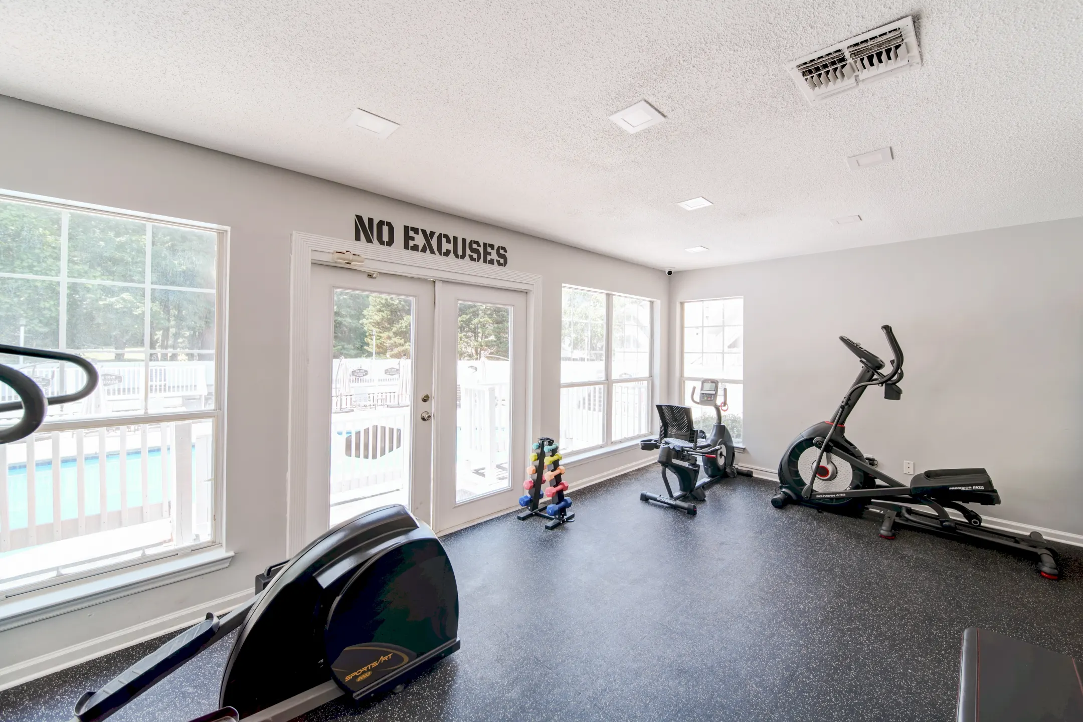 Fitness Weight Room - The Cove Apartment Homes - Gastonia, NC