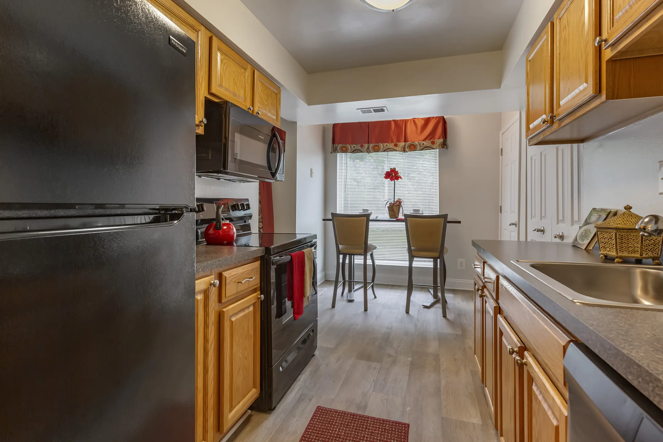 Kitchen - The Apartments at The Sycamores - Reston, VA
