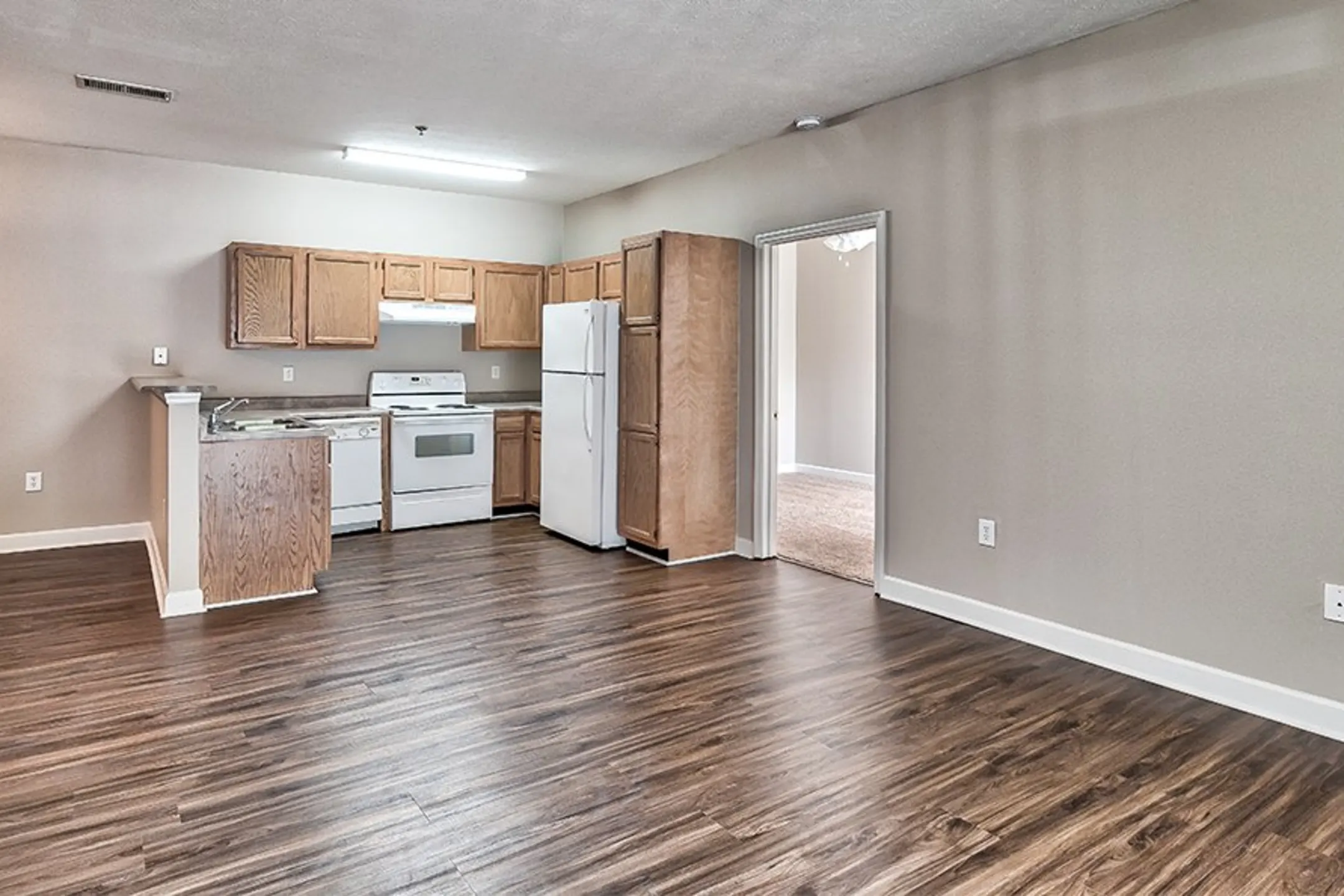 Living Room - Main Street Apartments - Huntsville, AL