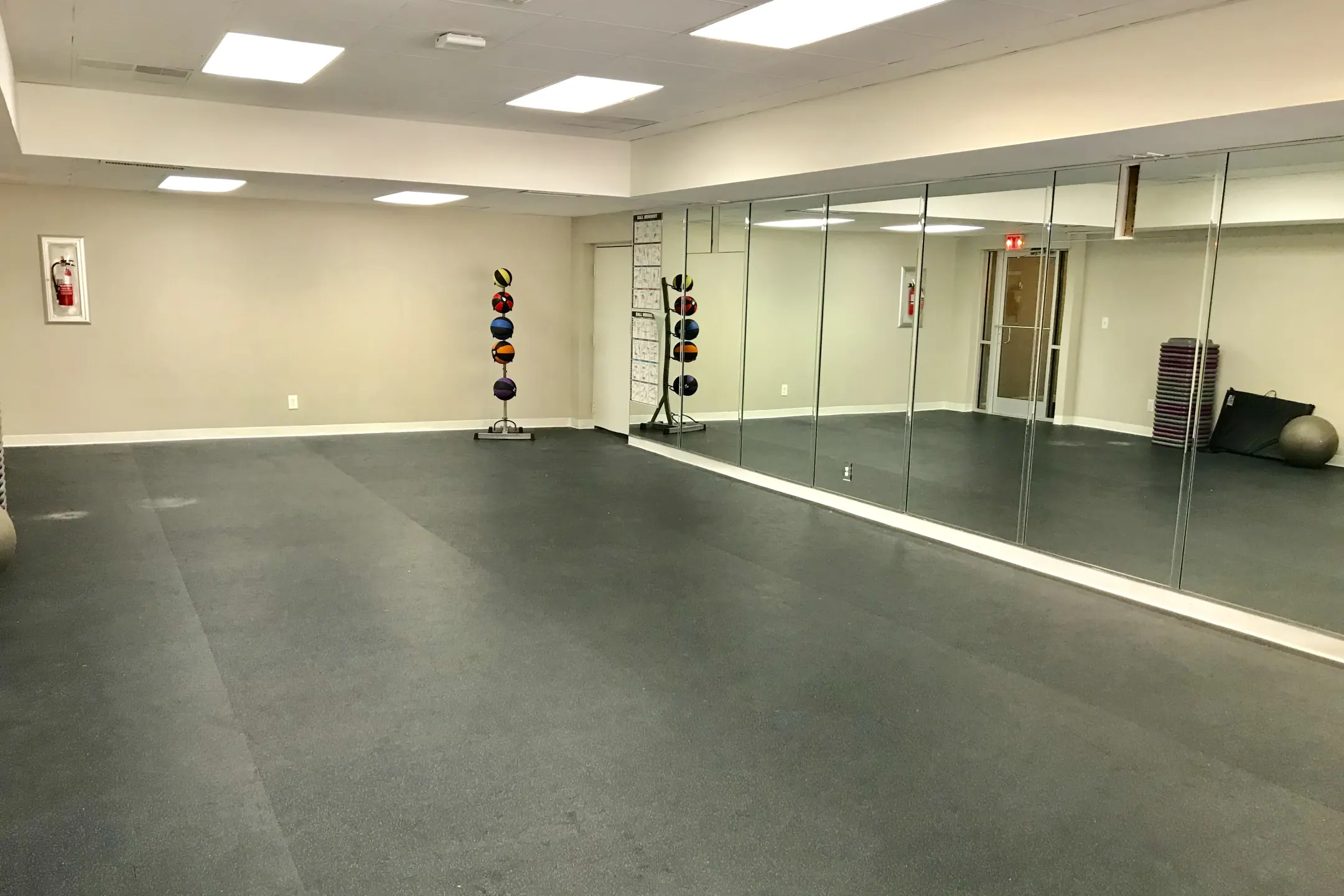 Fitness Weight Room - District At West Market Apartments - Greensboro, NC