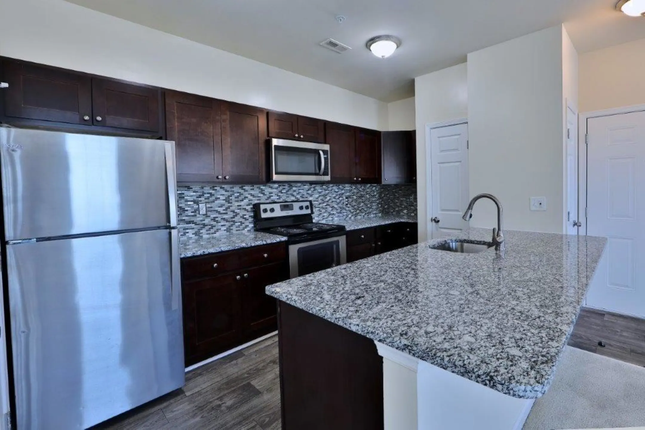 Kitchen - The Apartments at Diamond Ridge - Windsor Mill, MD