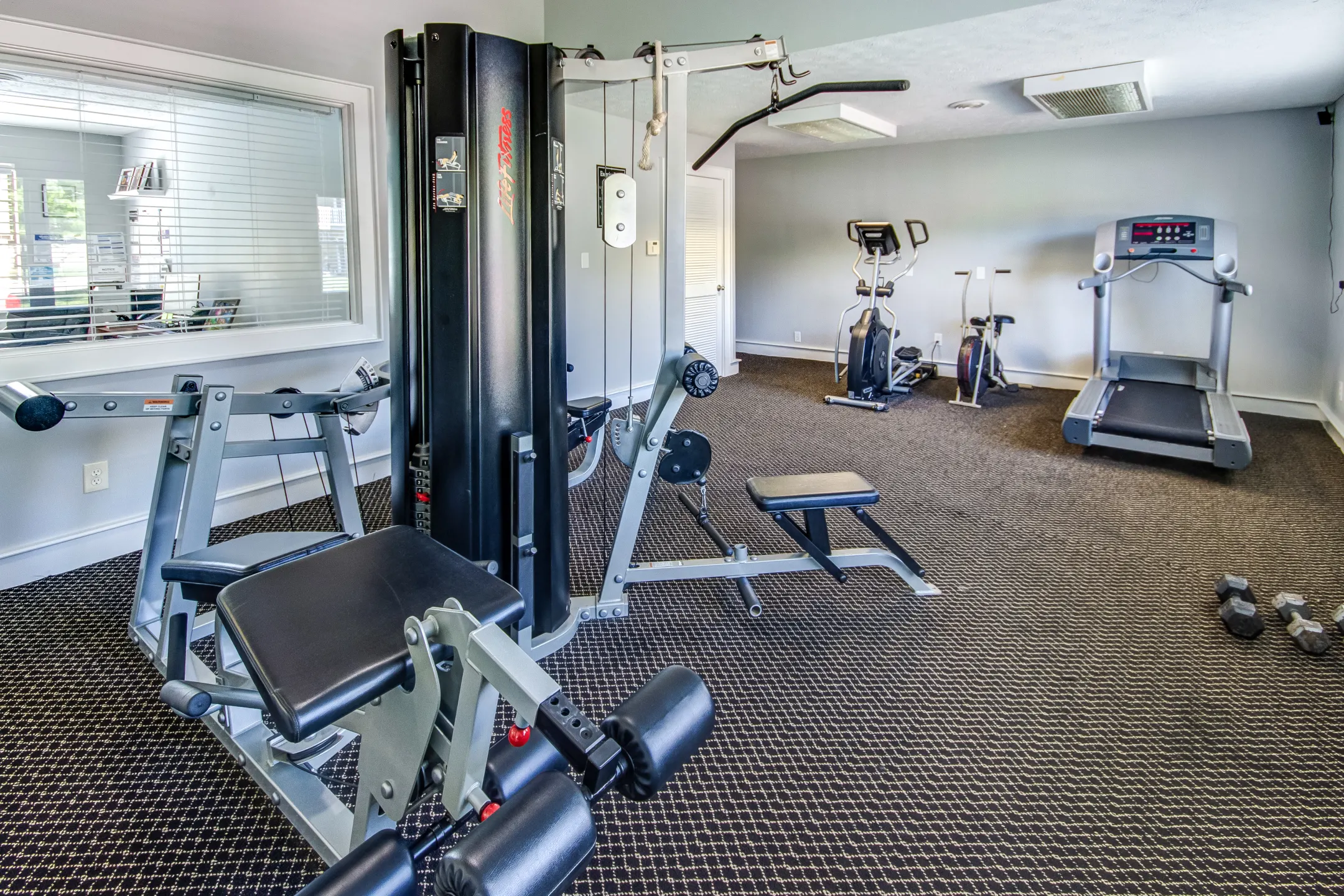 Fitness Weight Room - The Court at Sandstone Apartments - Greenwood, IN