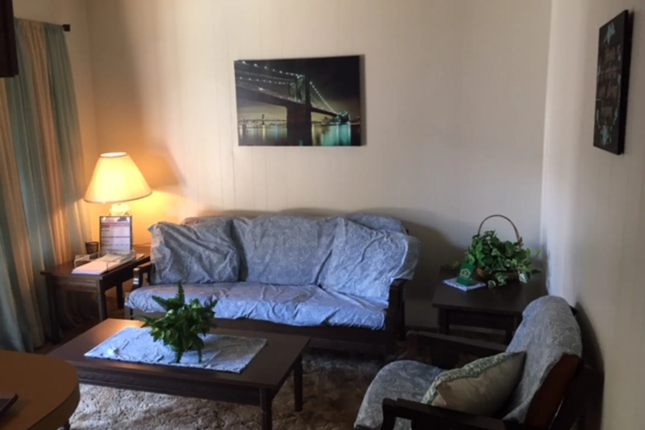 Living Room - Whispering Oaks Apartments - Waco, TX