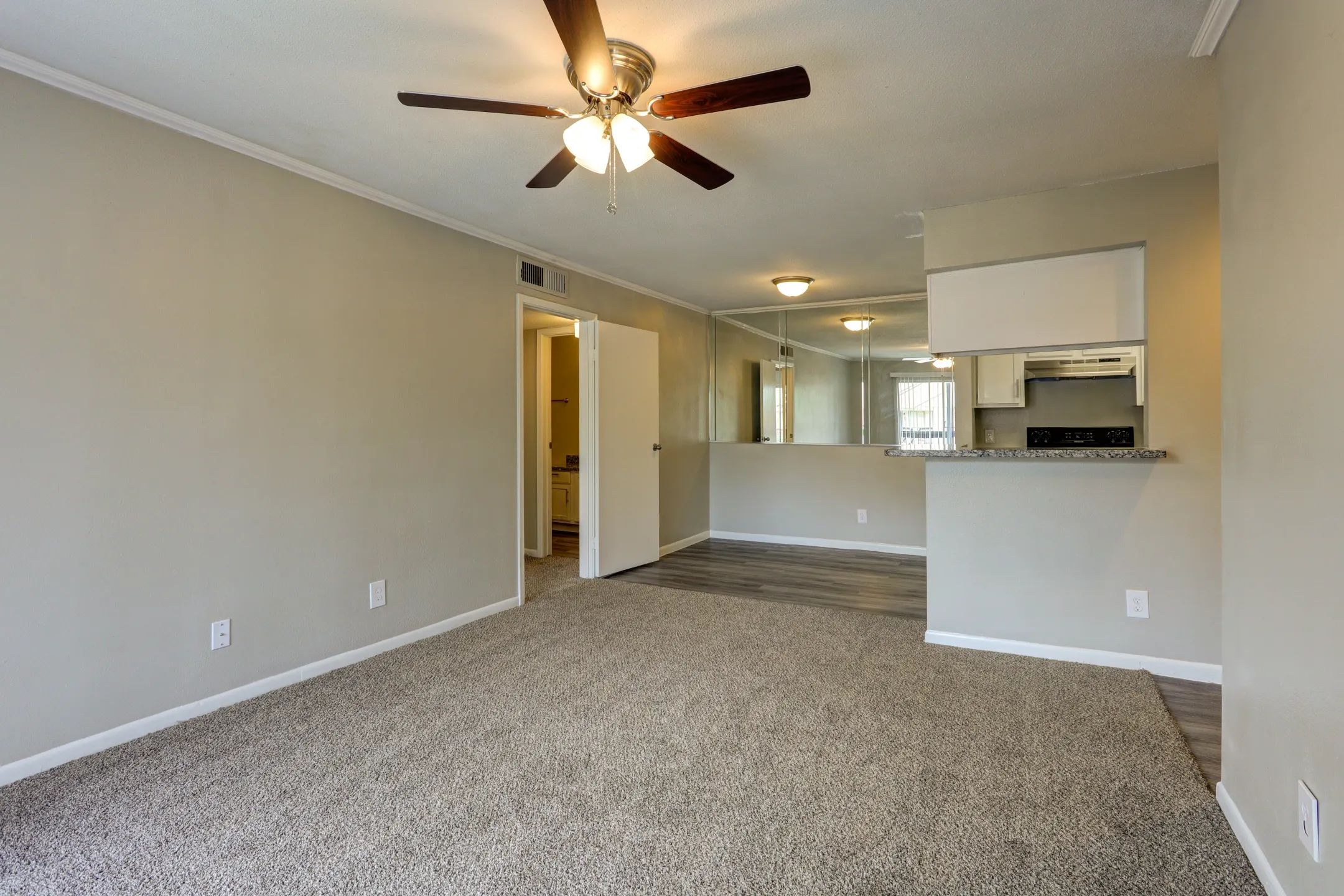 Living Room - Riverwalk Apartments - Conroe, TX