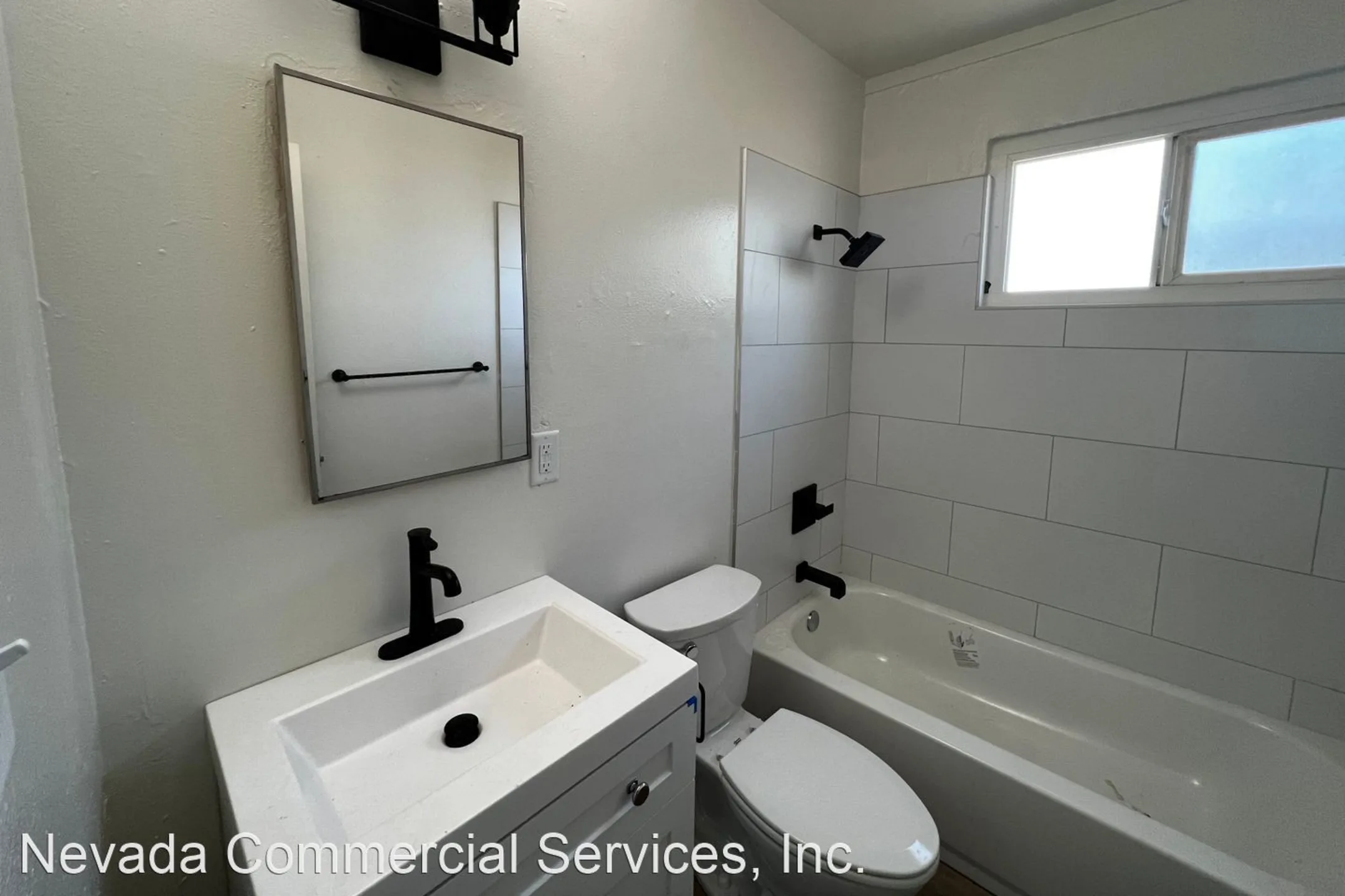Bathroom - Creekside Townhome Apartments - Reno, NV