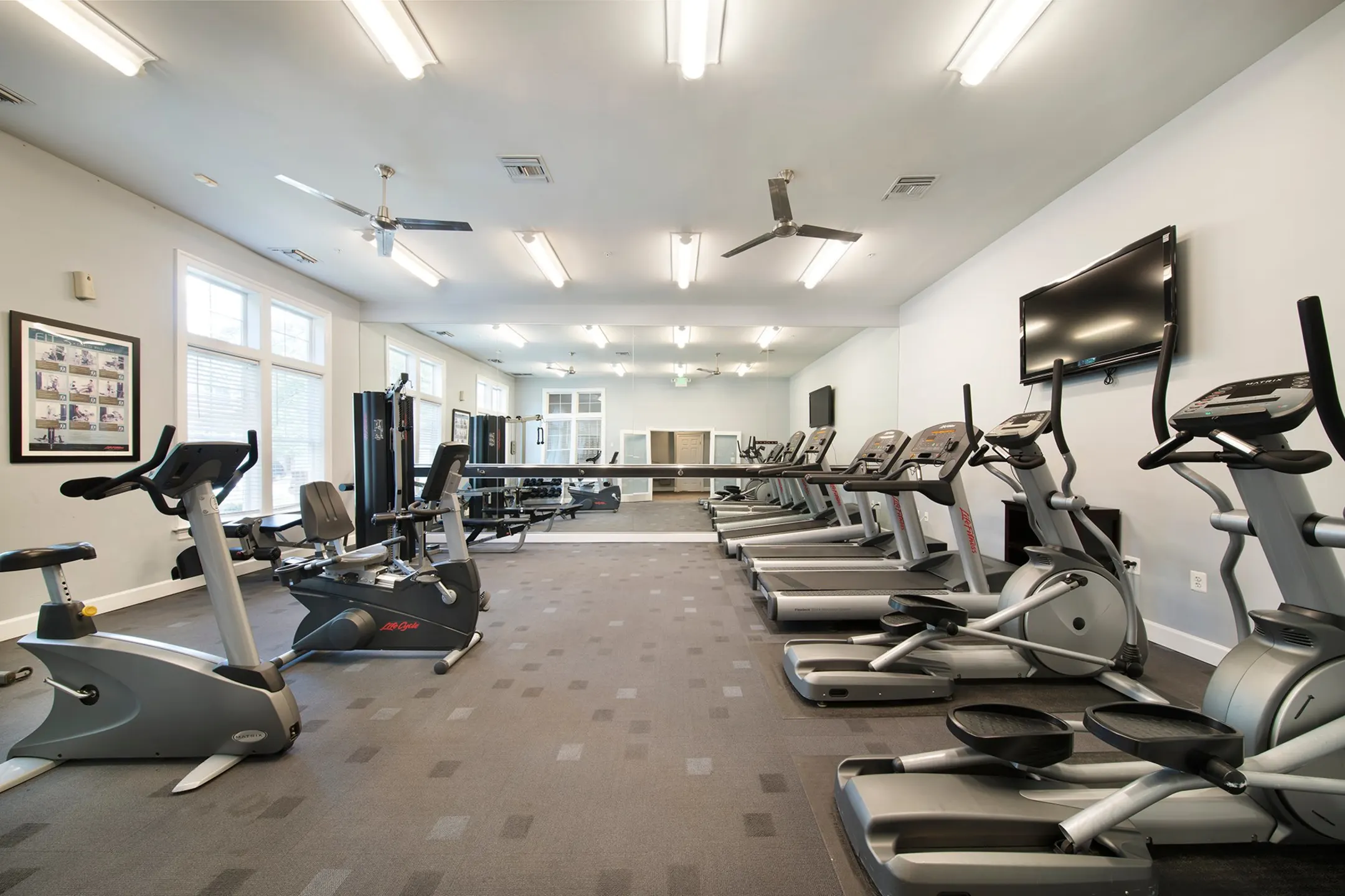 Fitness Weight Room - The Apartments at Cambridge Court - Rosedale, MD