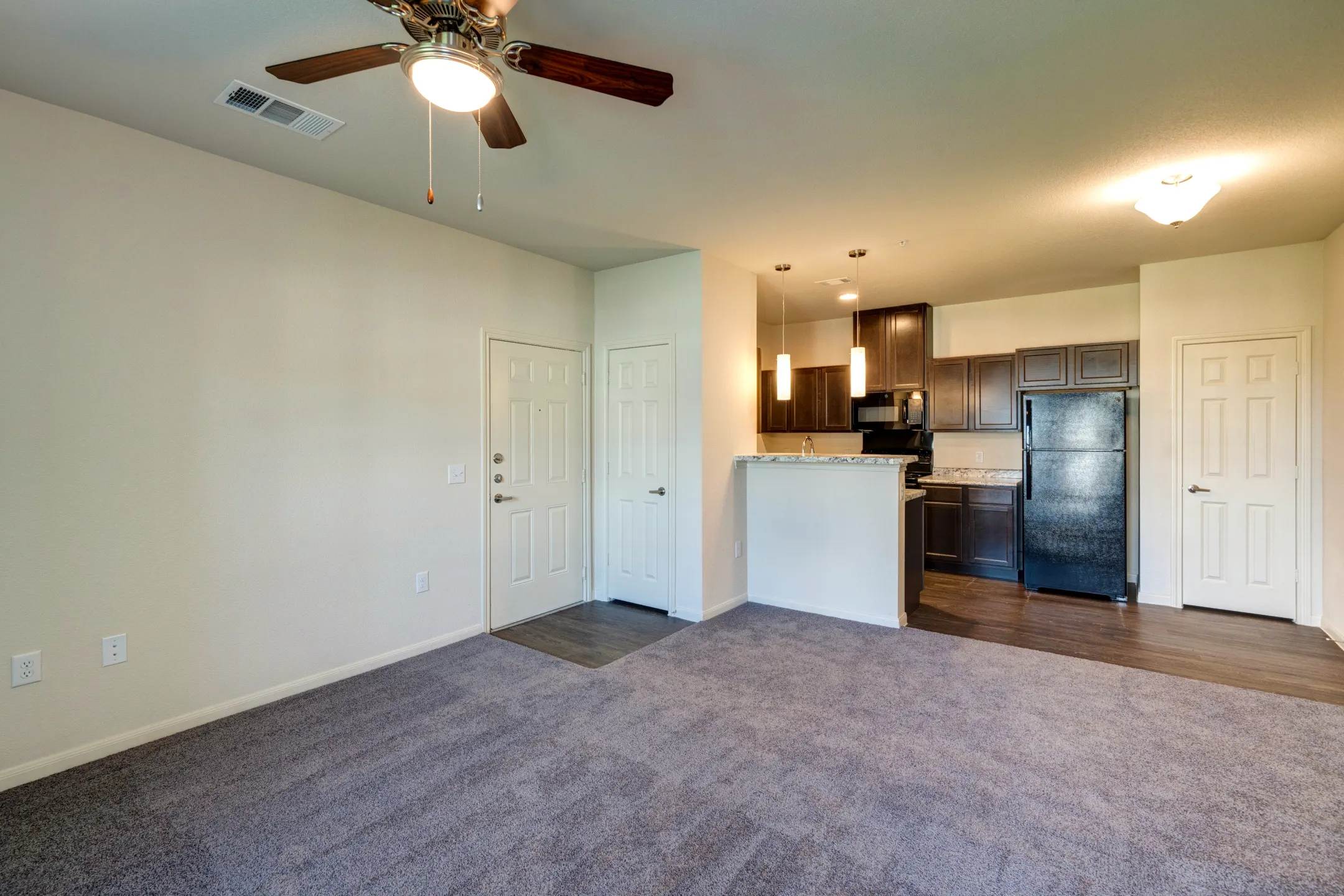 Living Room - Mesa West Apartments - San Antonio, TX