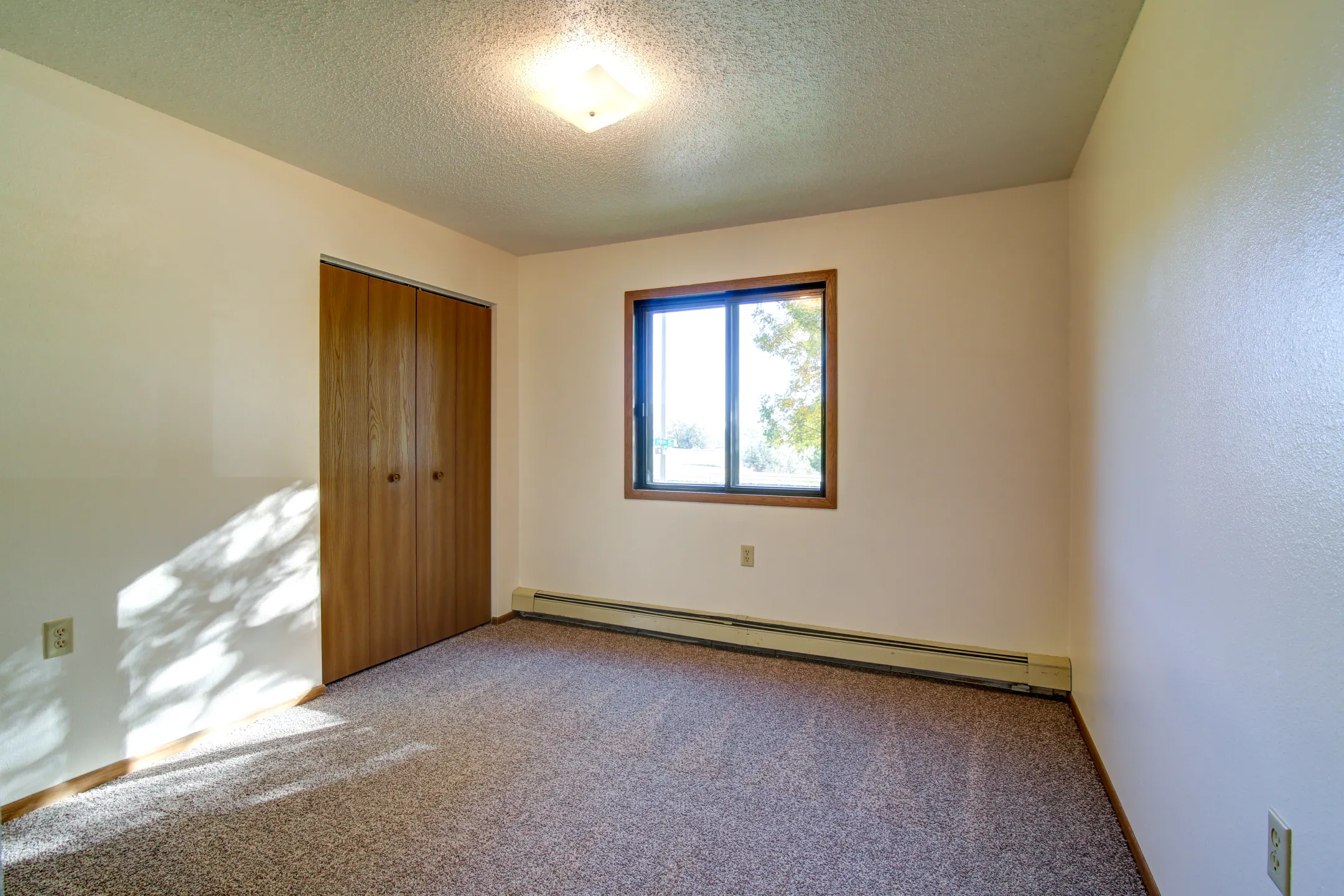 Bedroom - Calgary Apartments - Bismarck, ND