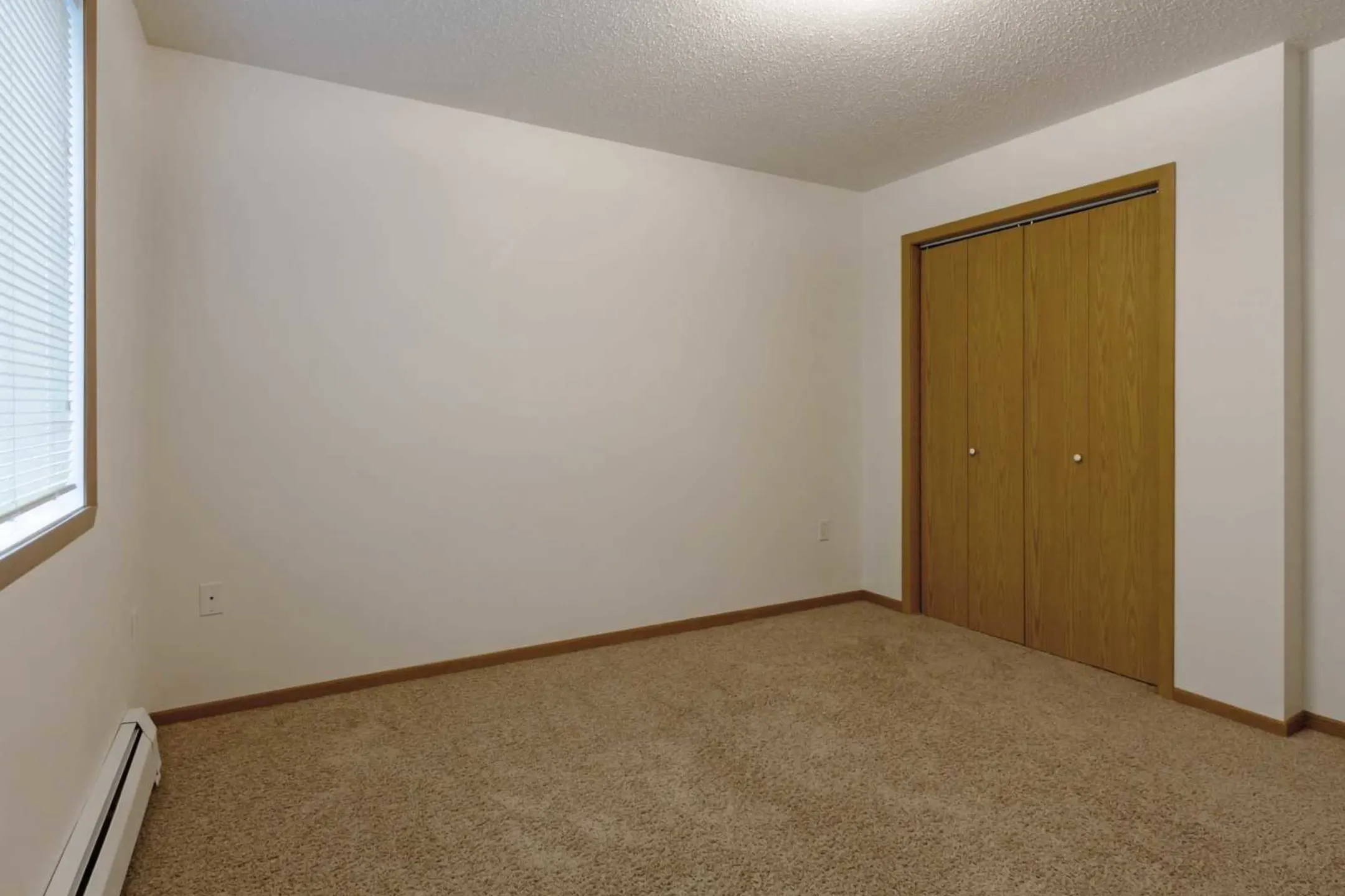 Bedroom - The Woods Apartments - Fargo, ND