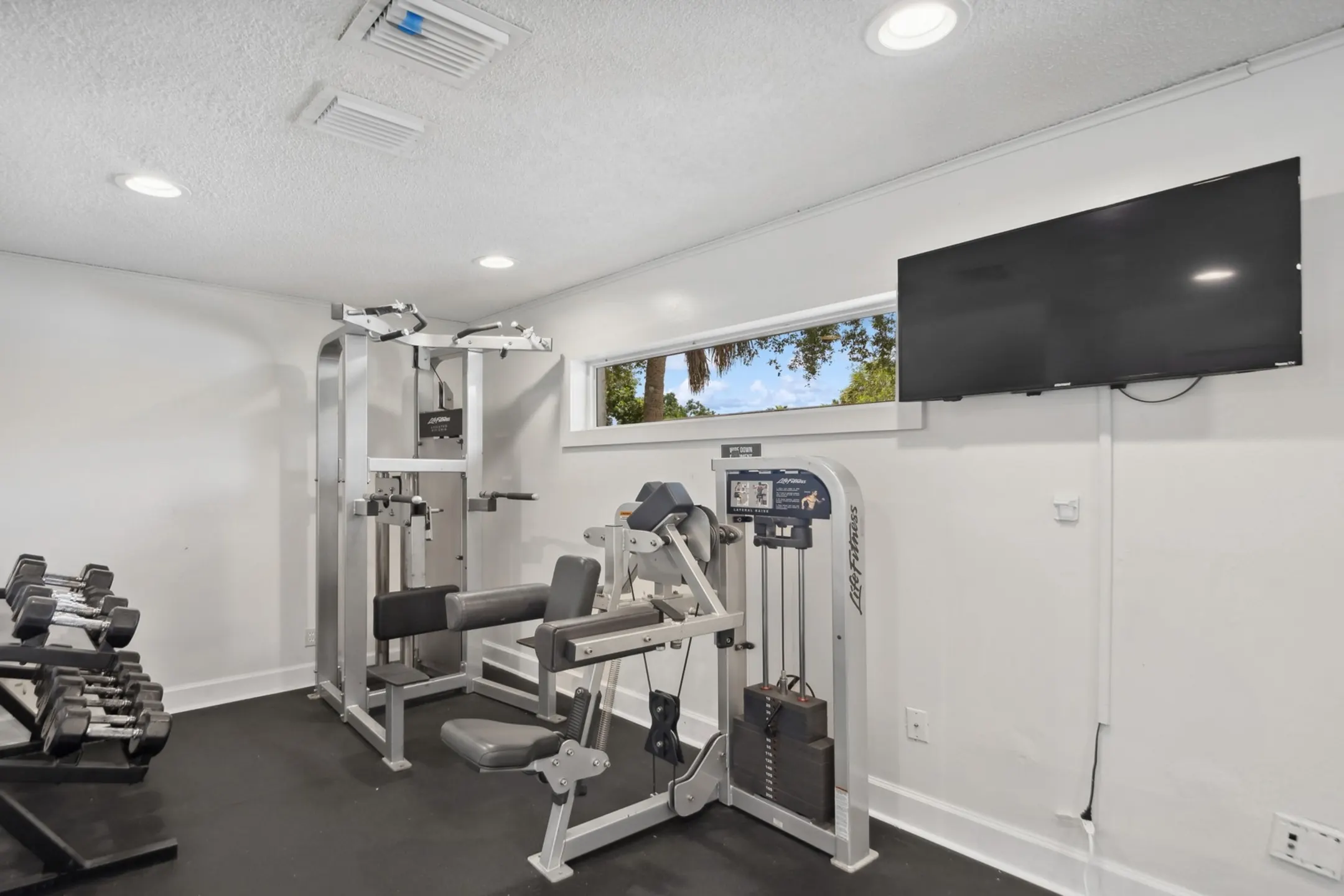 Fitness Weight Room - Plantation Gardens Apartment Homes - Plantation, FL