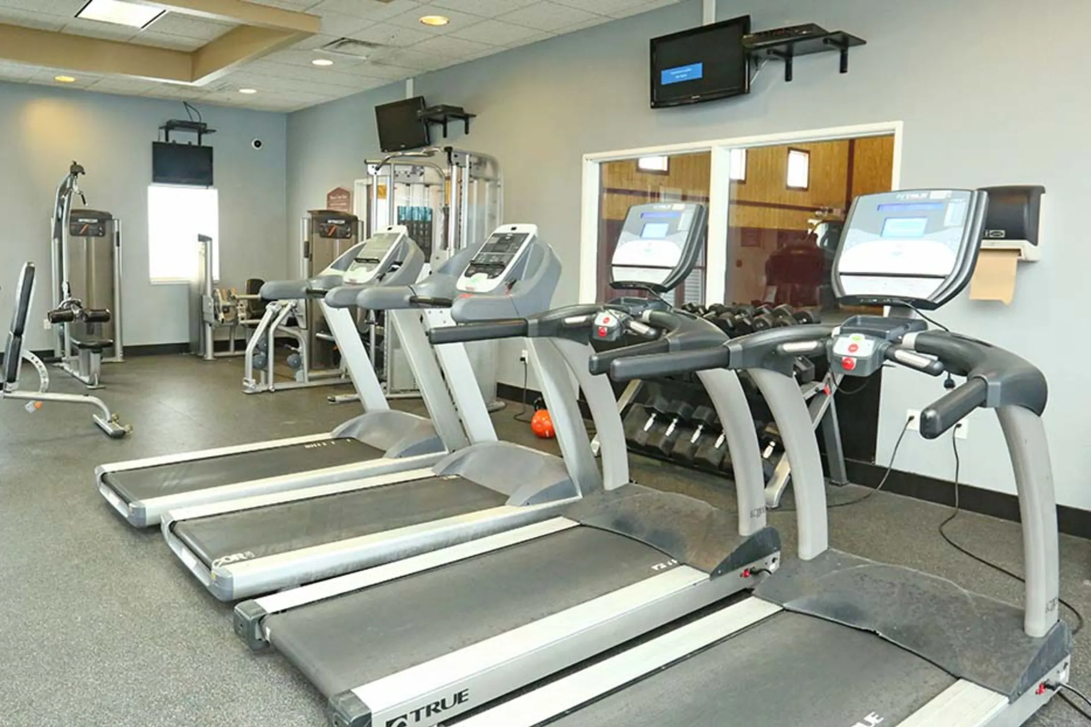 Fitness Weight Room - The Village at Bluegrass - Mount Pleasant, MI