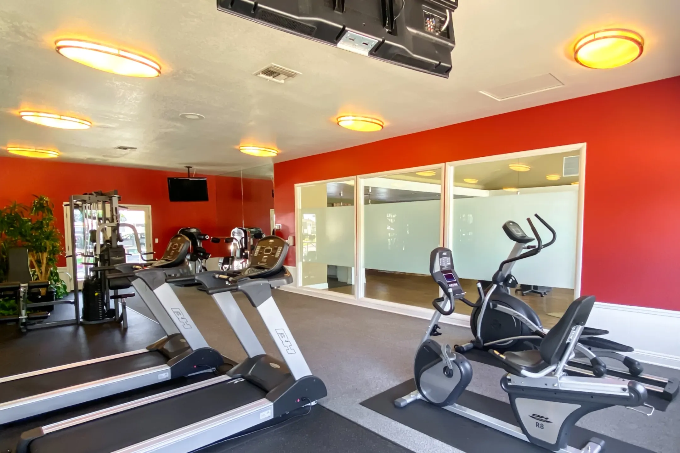 Fitness Weight Room - Woodmere Apartments - Ontario, CA