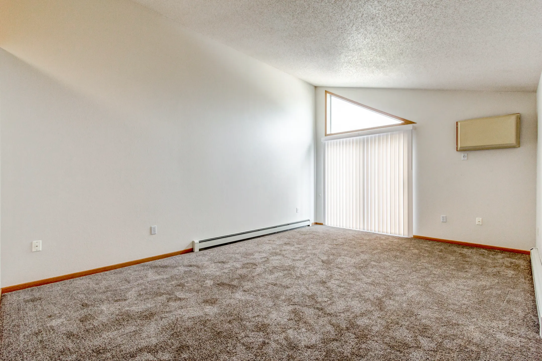 Living Room - Wheatland Place Apartments & Townhomes - Fargo, ND