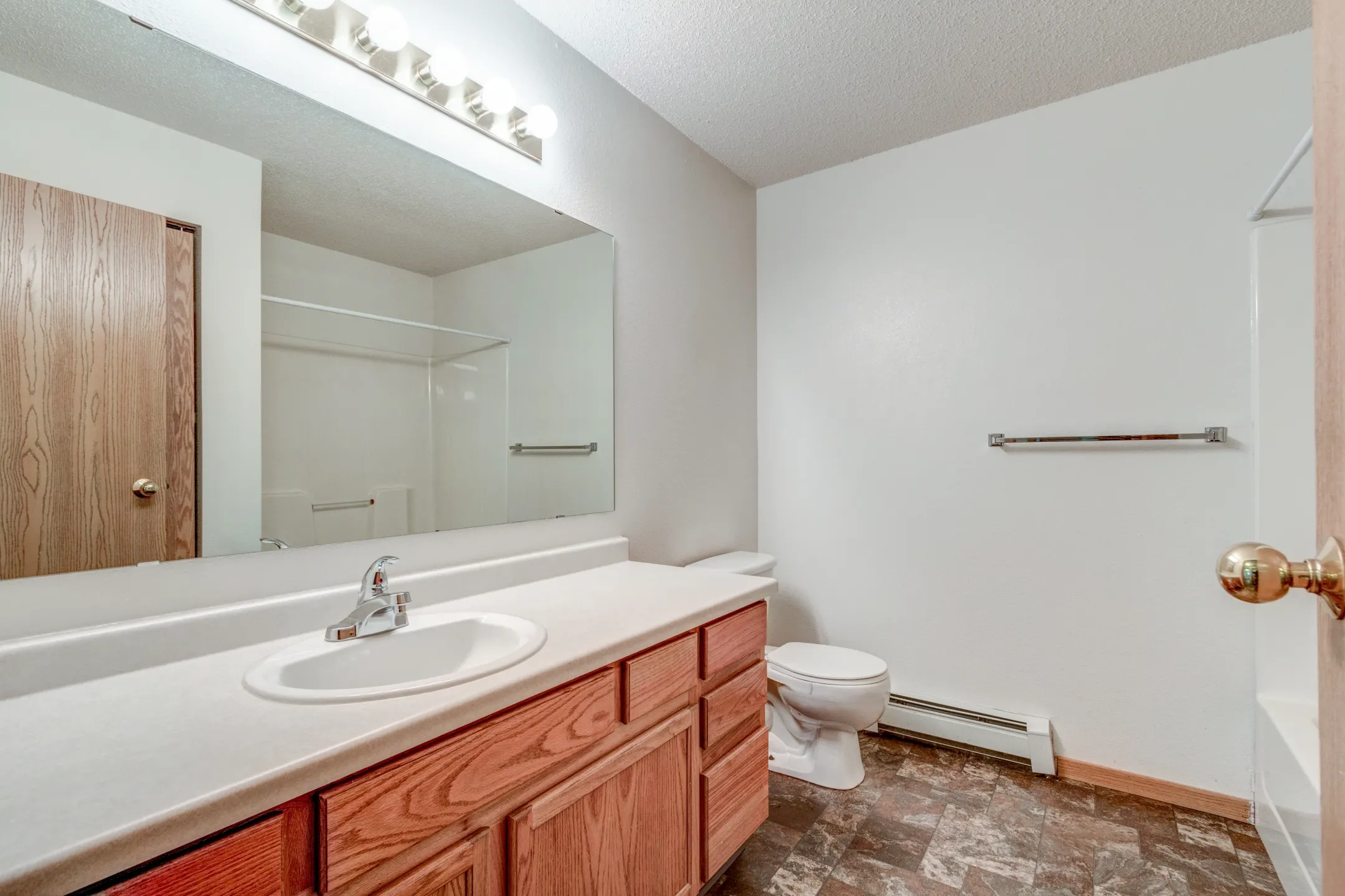 Bathroom - Wheatland Place Apartments & Townhomes - Fargo, ND