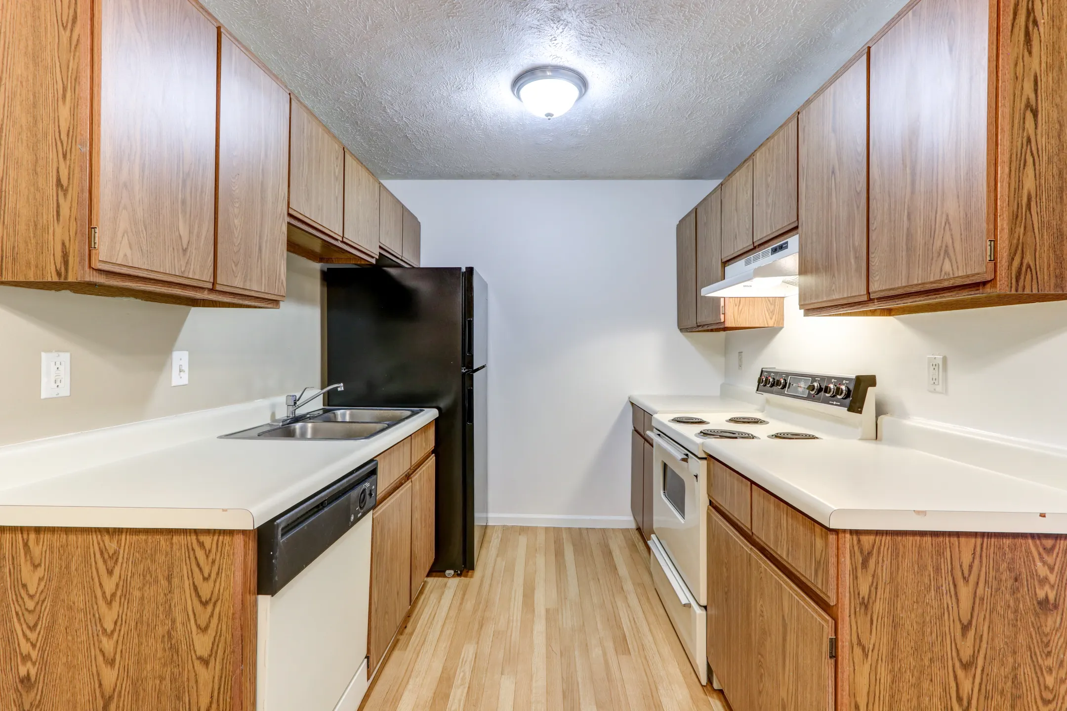 Kitchen - Homestead Apartments - East Lansing, MI