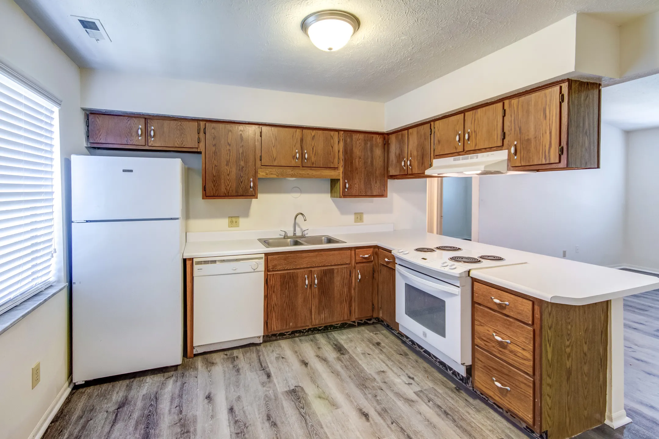 Kitchen - The Court at Sandstone Apartments - Greenwood, IN