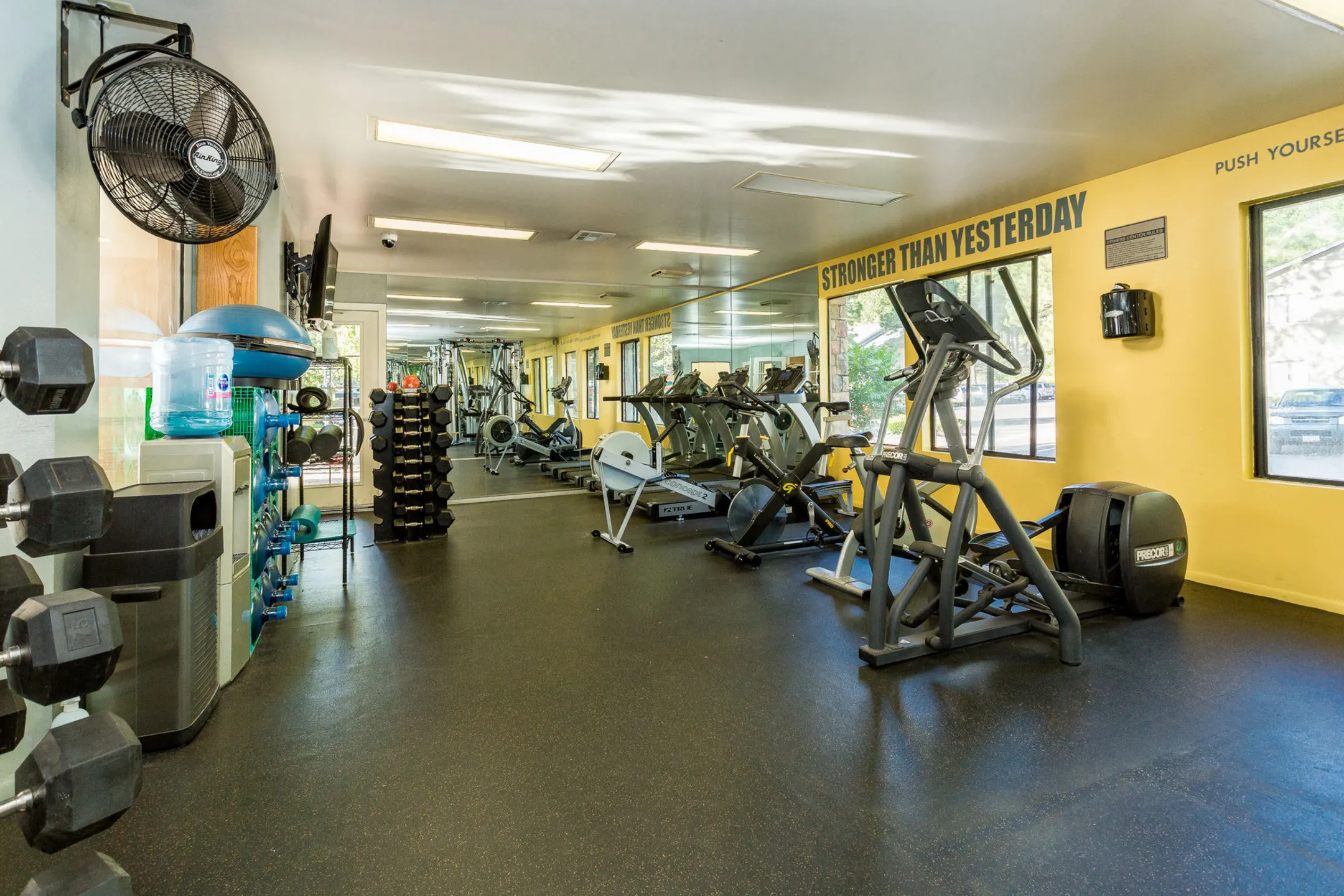 Fitness Weight Room - Woodlands Village Apartments - Flagstaff, AZ