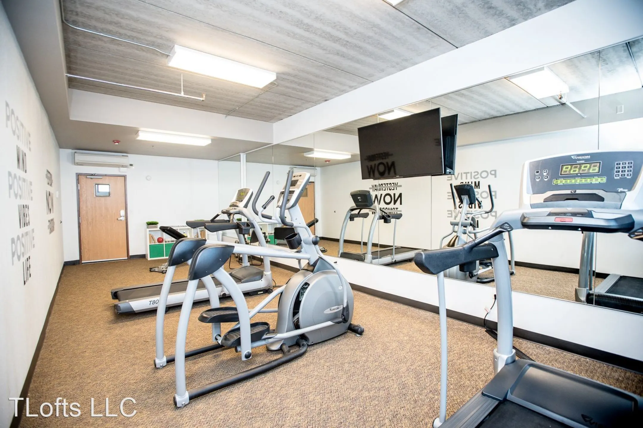 Fitness Weight Room - TLofts Apartments - Fargo, ND