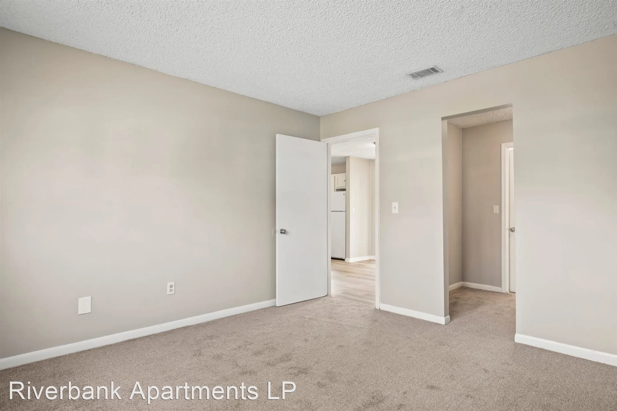 Bedroom - Riverbank Apartment Homes - Jacksonville, FL