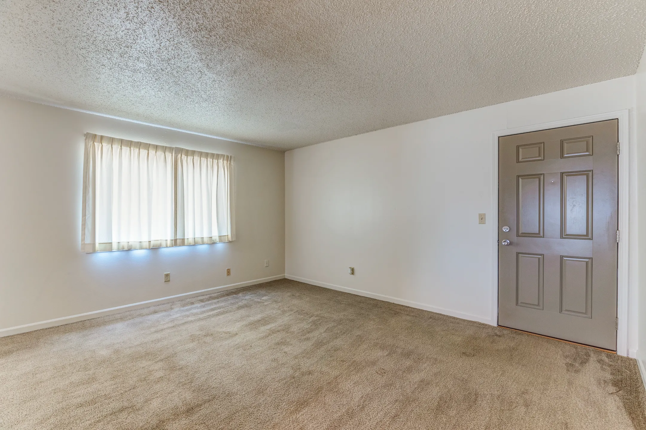 Living Room - Emerald Court Apartments - Iowa City, IA