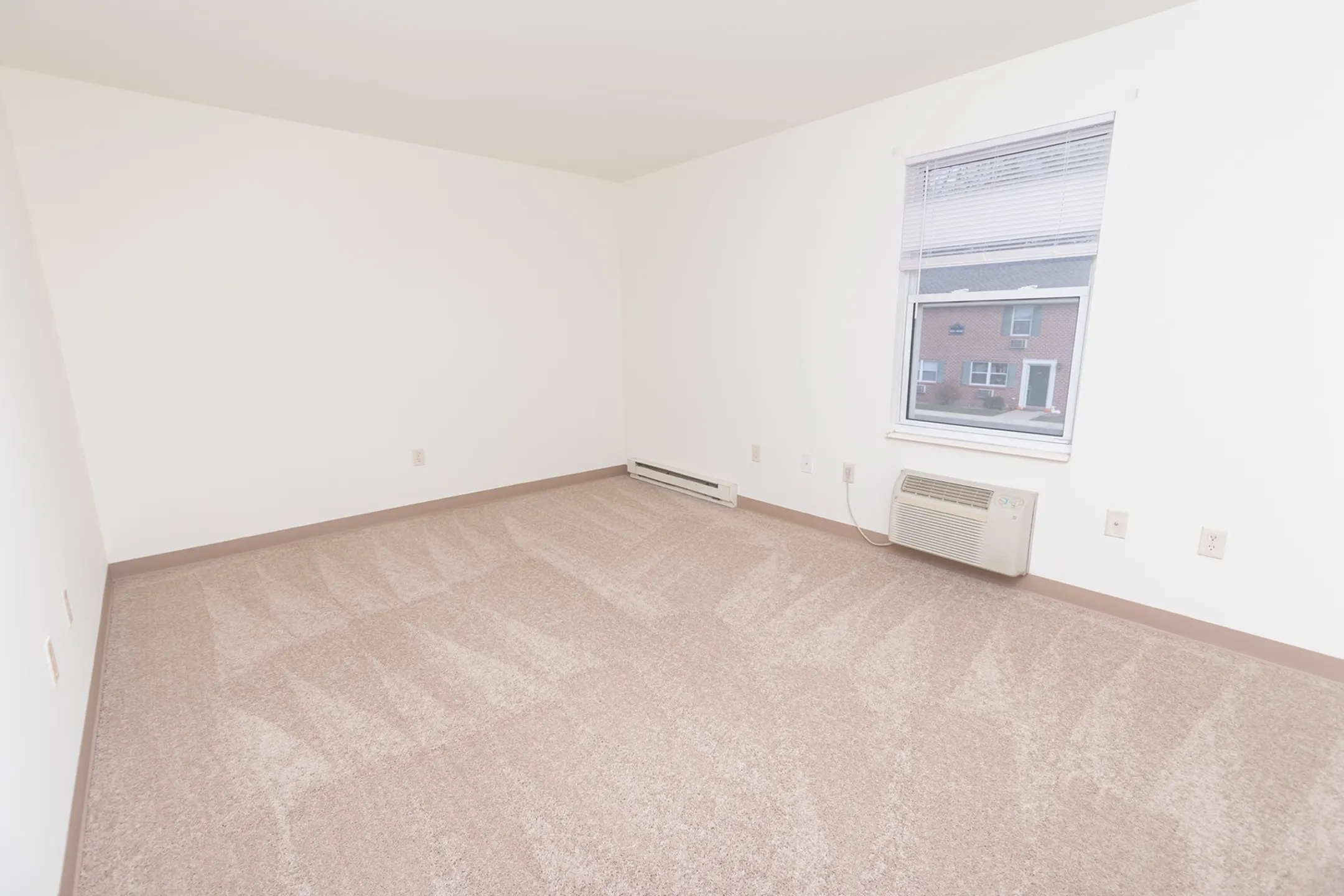 Living Room - Shippensburg Village Townhomes - Shippensburg, PA