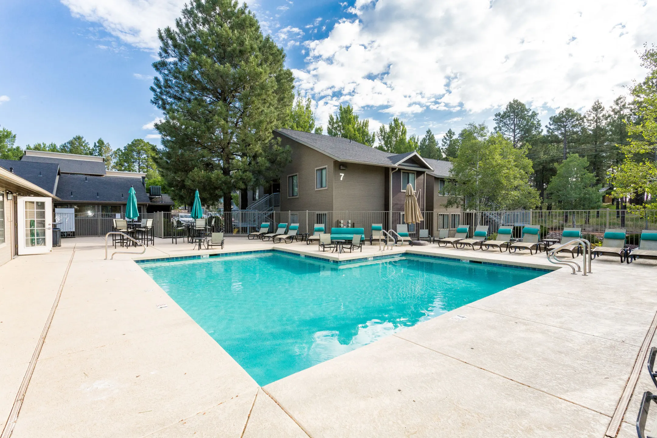 Pool - Woodlands Village Apartments - Flagstaff, AZ