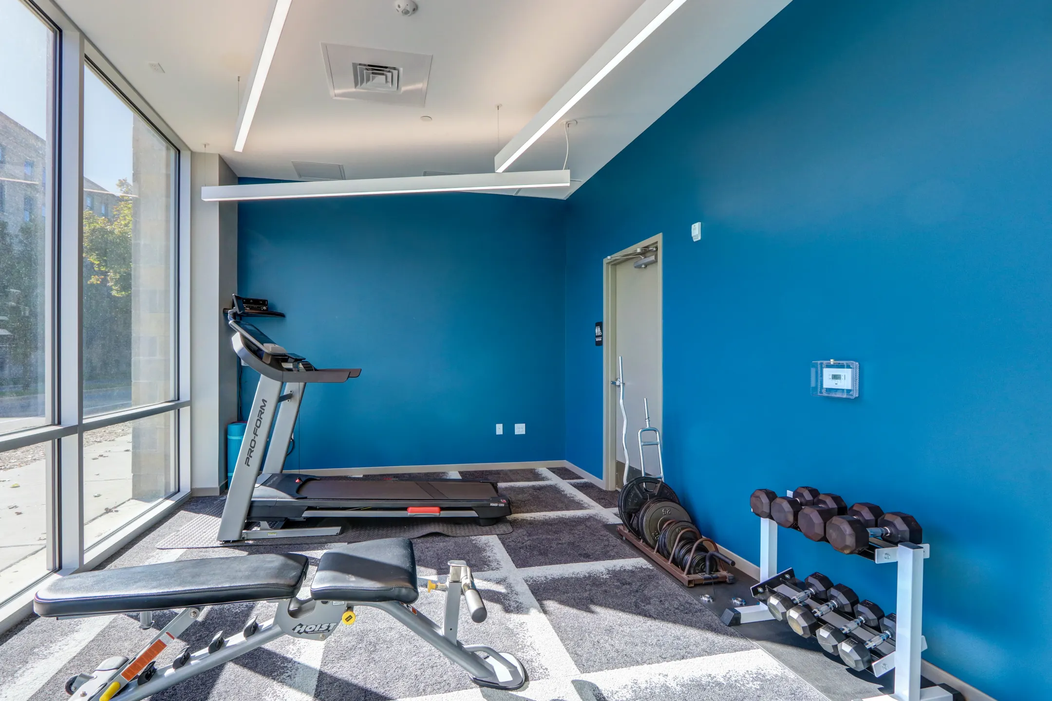 Fitness Weight Room - The Homes at Rivers Edge Apartments - Grand Rapids, MI