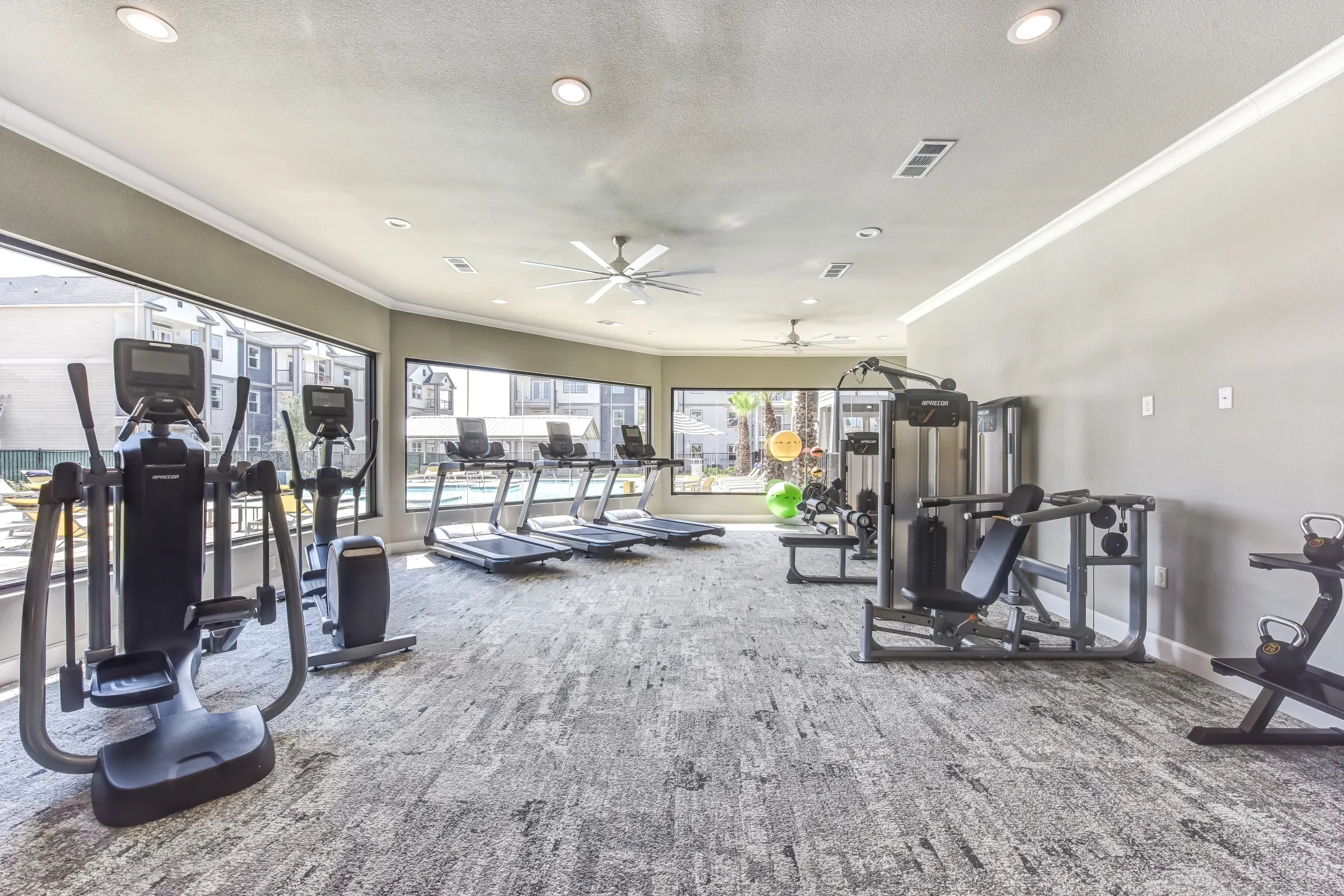 Fitness Weight Room - Forest Pines Apartments - Bryan, TX