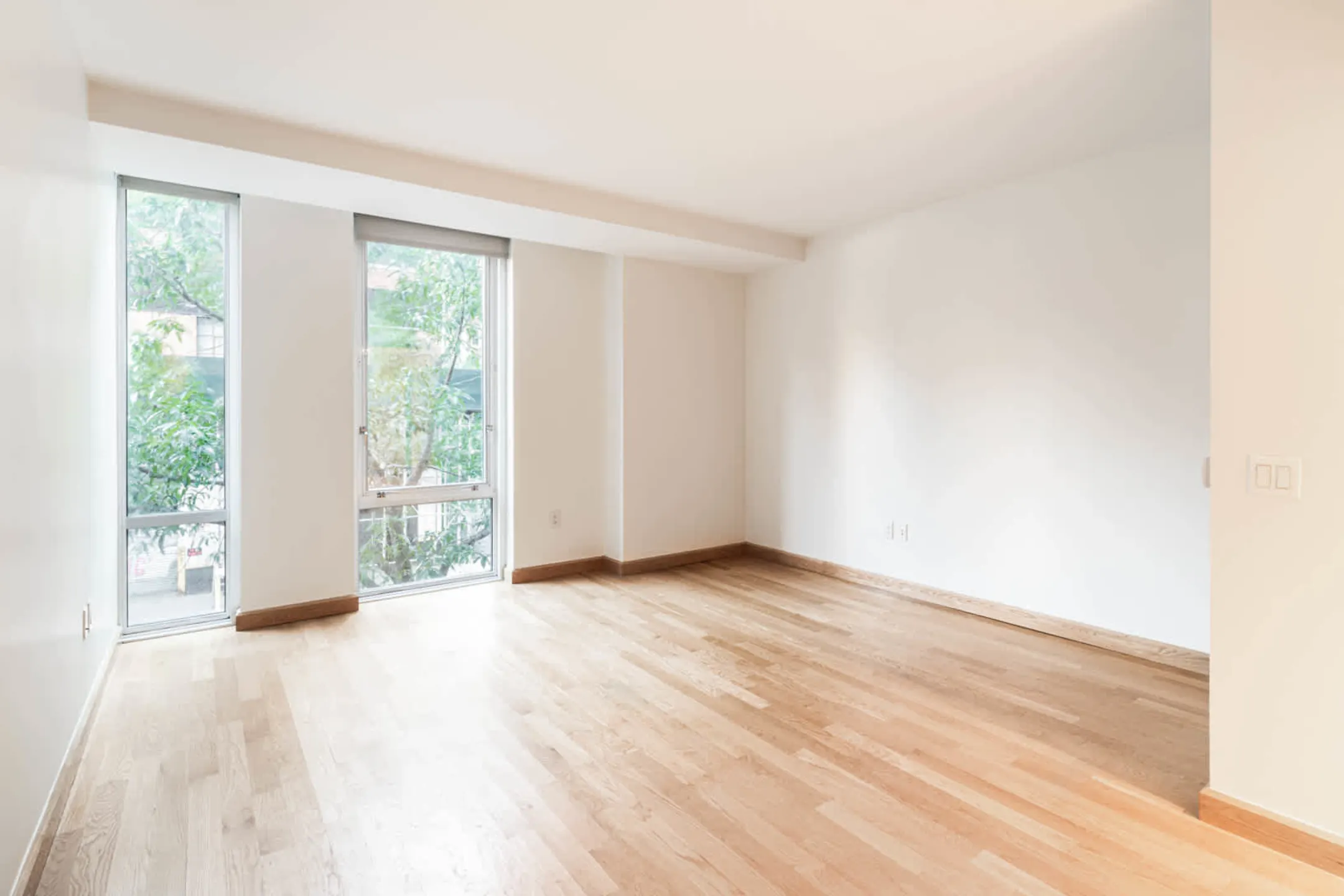 Living Room - Mantena Apartments - New York, NY
