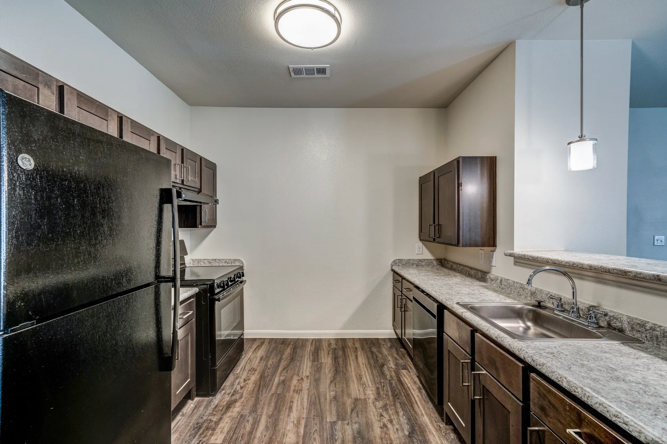 Kitchen - Trails at Leon Creek Apartment Homes - San Antonio, TX