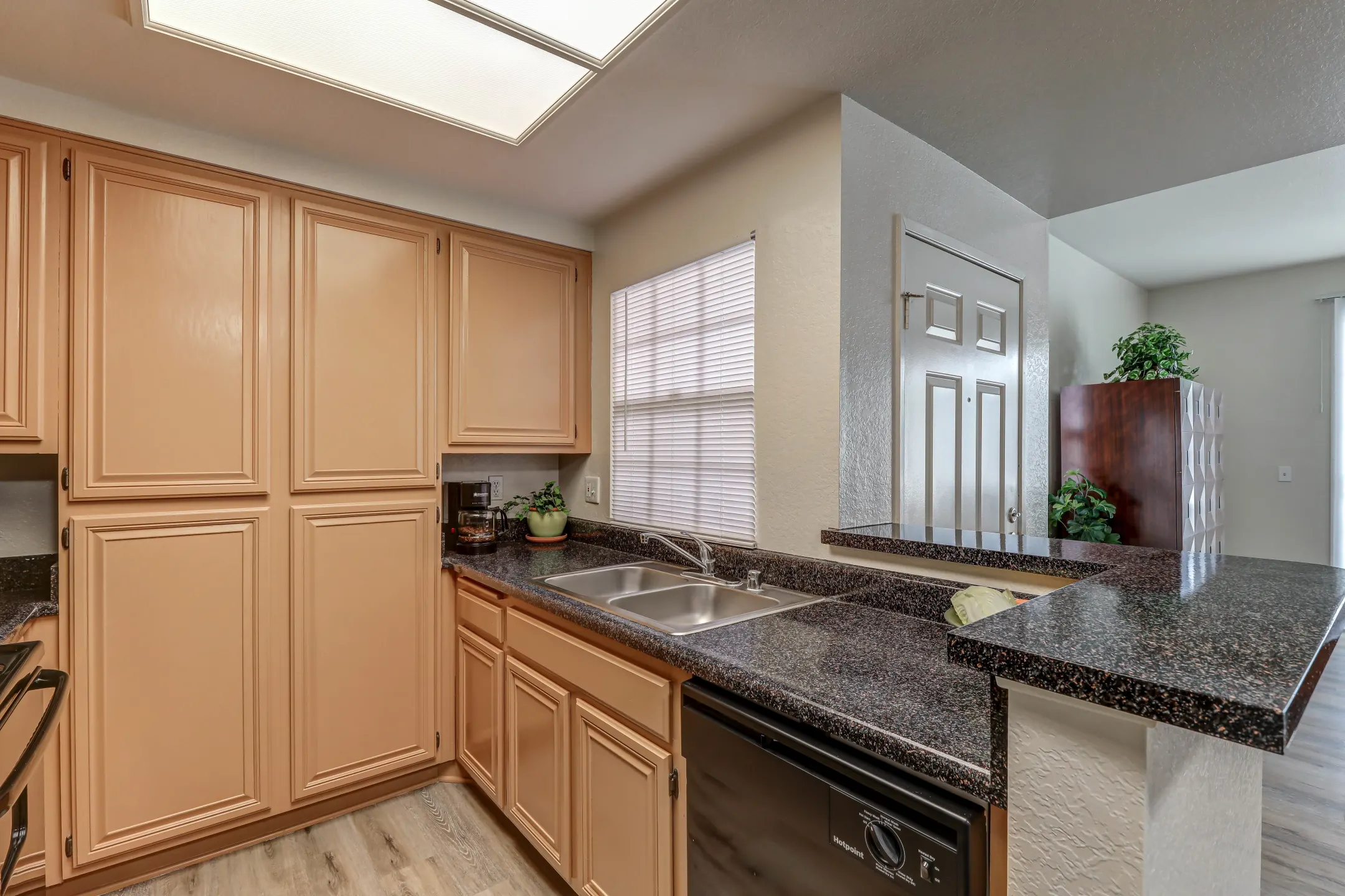 Kitchen - The Village Apartments at Heritage Place - Anaheim, CA