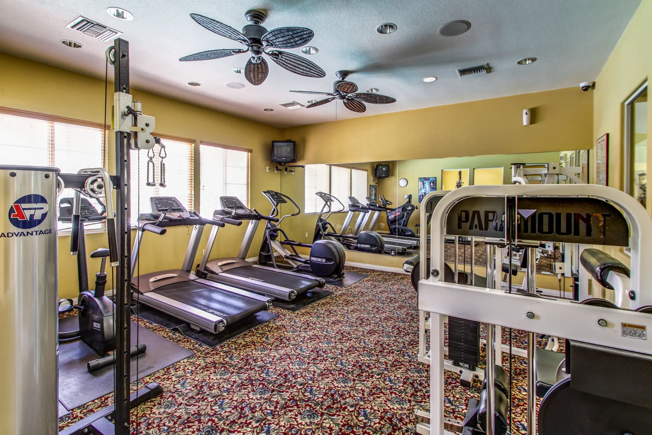 Fitness Weight Room - Silverhawk Apartment Homes at La Quinta - La Quinta, CA