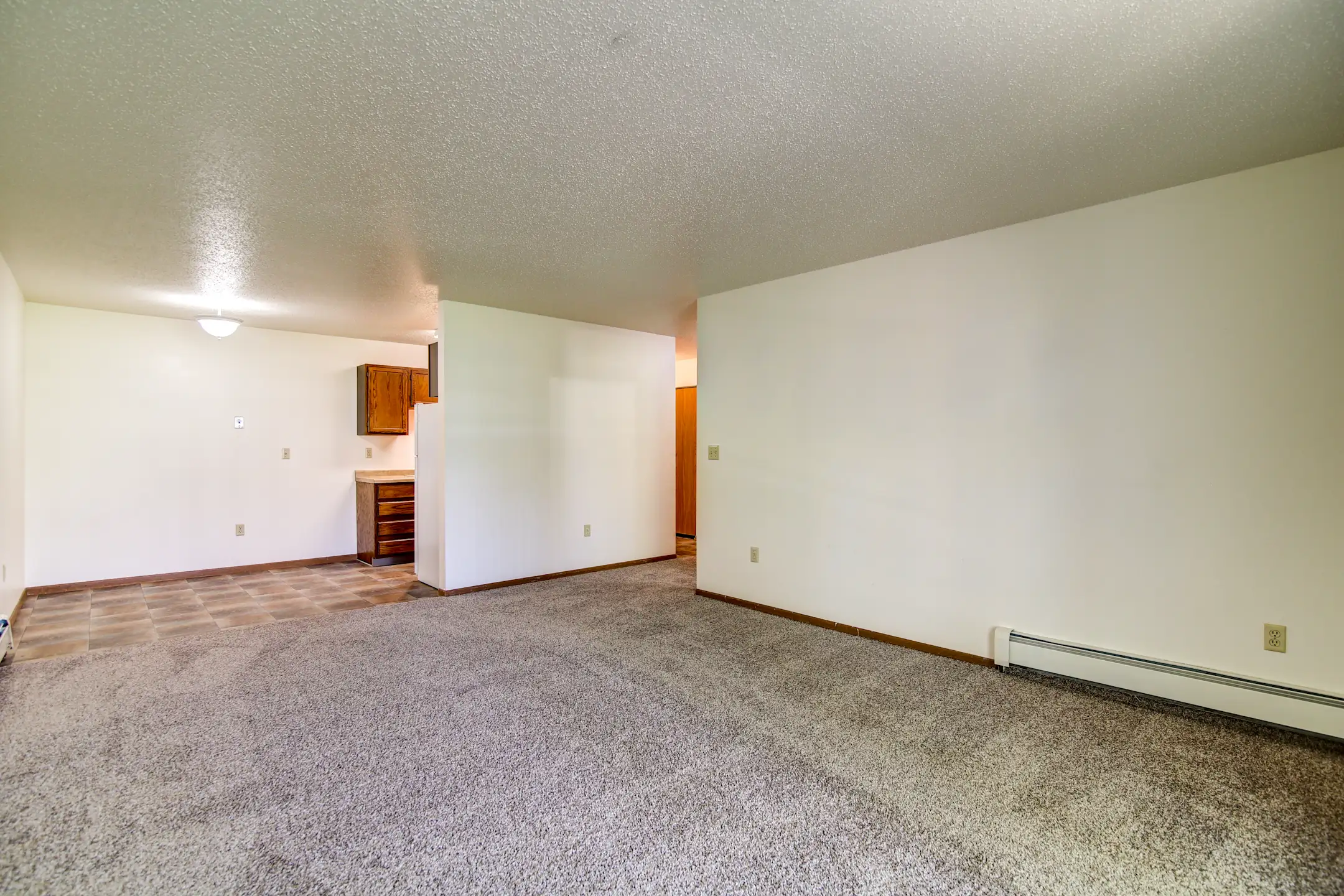 Living Room - Kirkwood Manor Apartments - Bismarck, ND