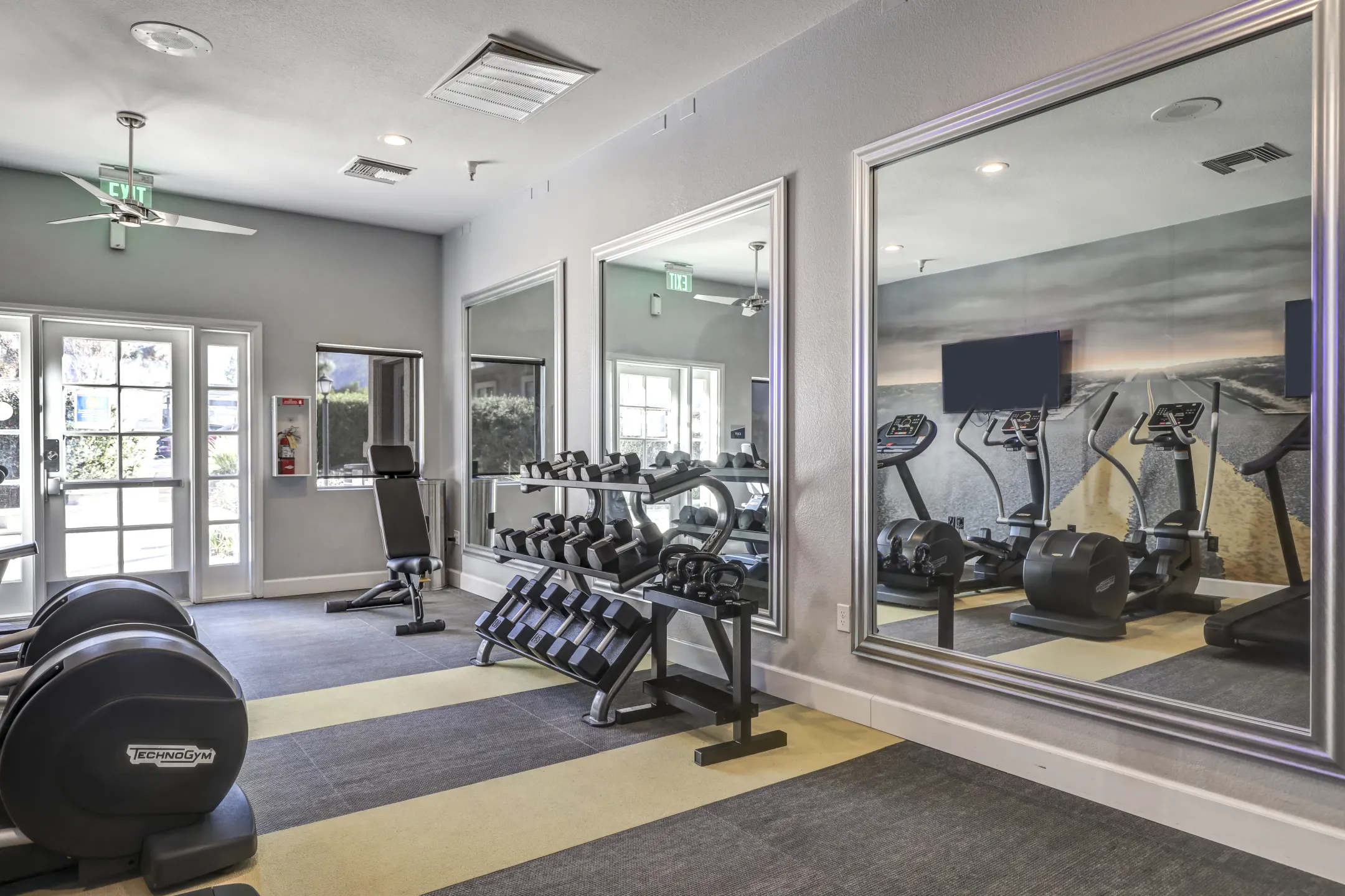 Fitness Weight Room - Berkdale Apartments - Riverside, CA