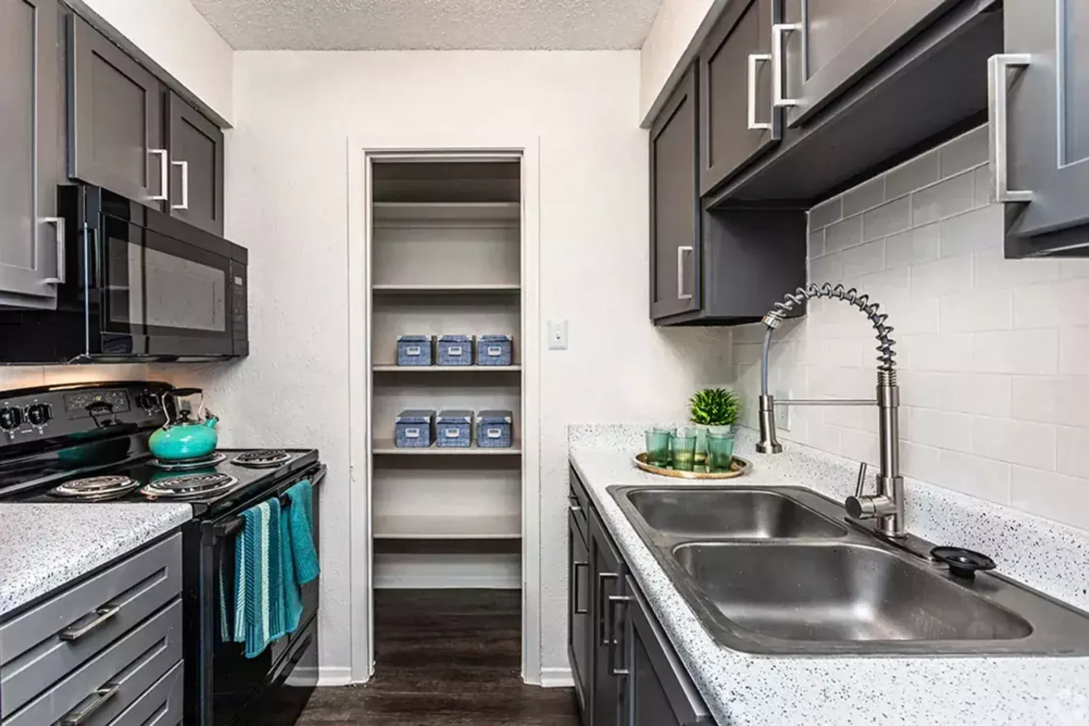Kitchen - Peppermill Apartments - Universal City, TX