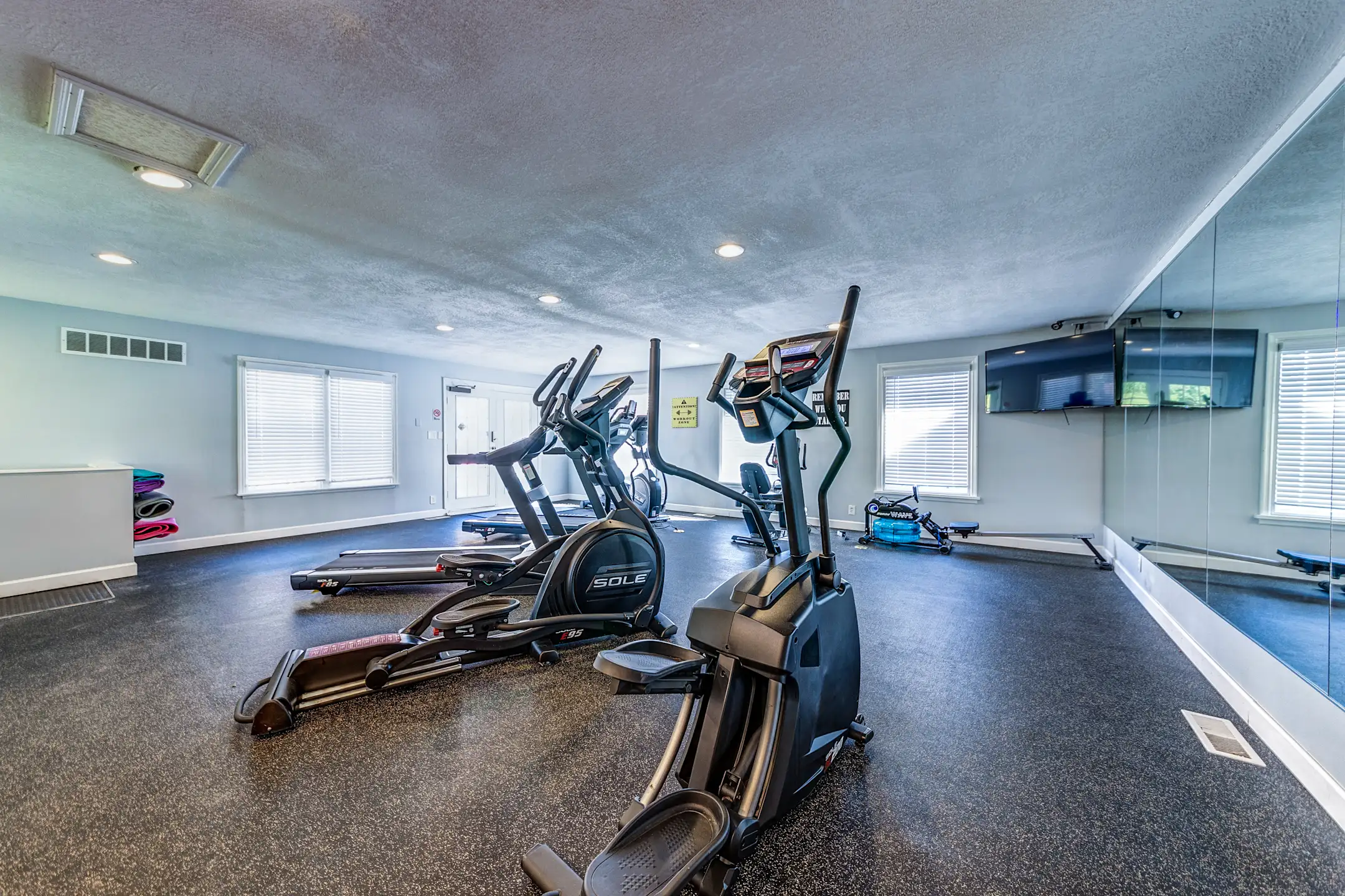 Fitness Weight Room - Warson Village Towne House Apartments - Saint Louis, MO