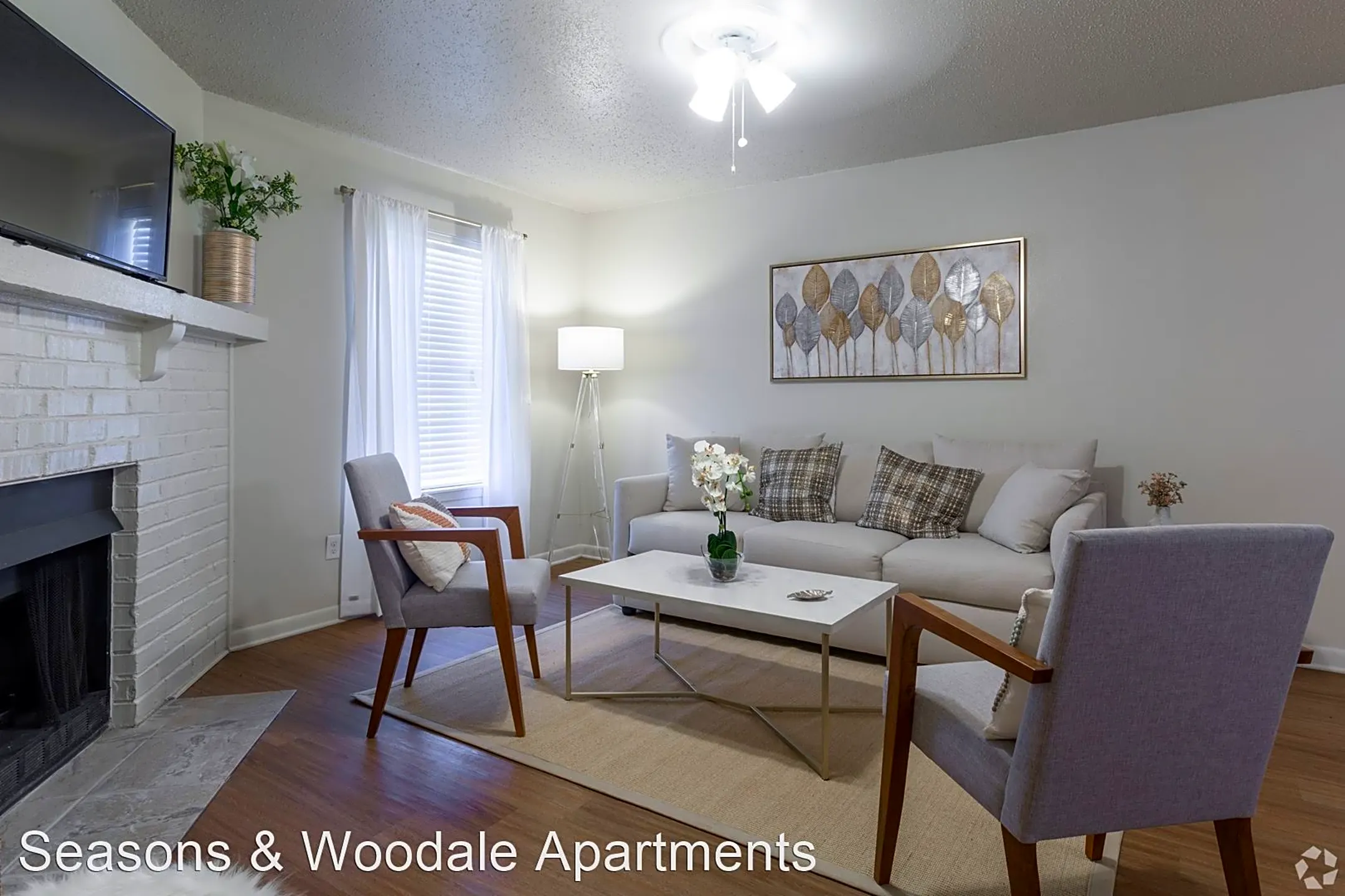 Living Room - Seasons & Woodale Apartments - Monroe, LA