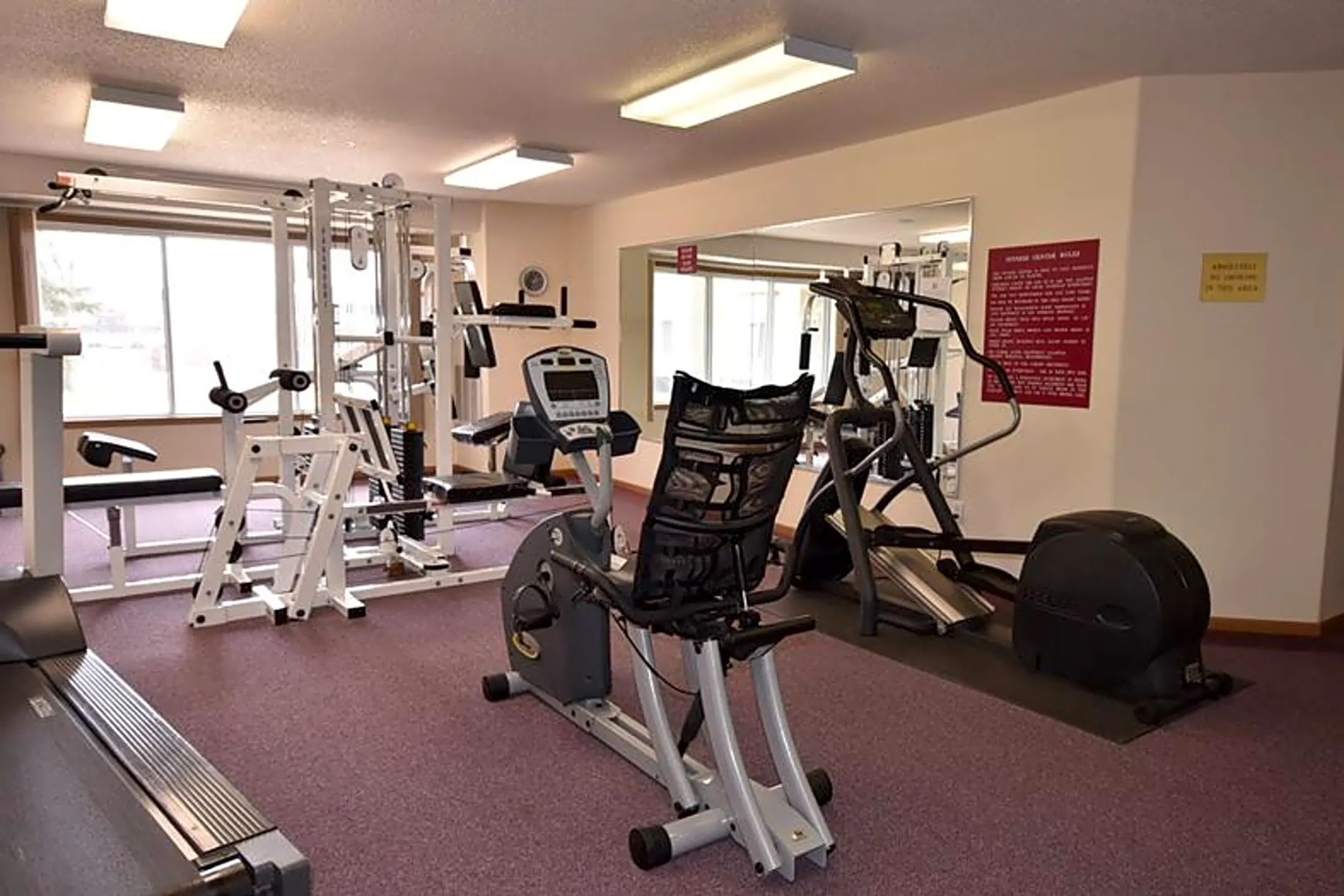 Fitness Weight Room - Sun West I & II Apartment Homes - Fargo, ND