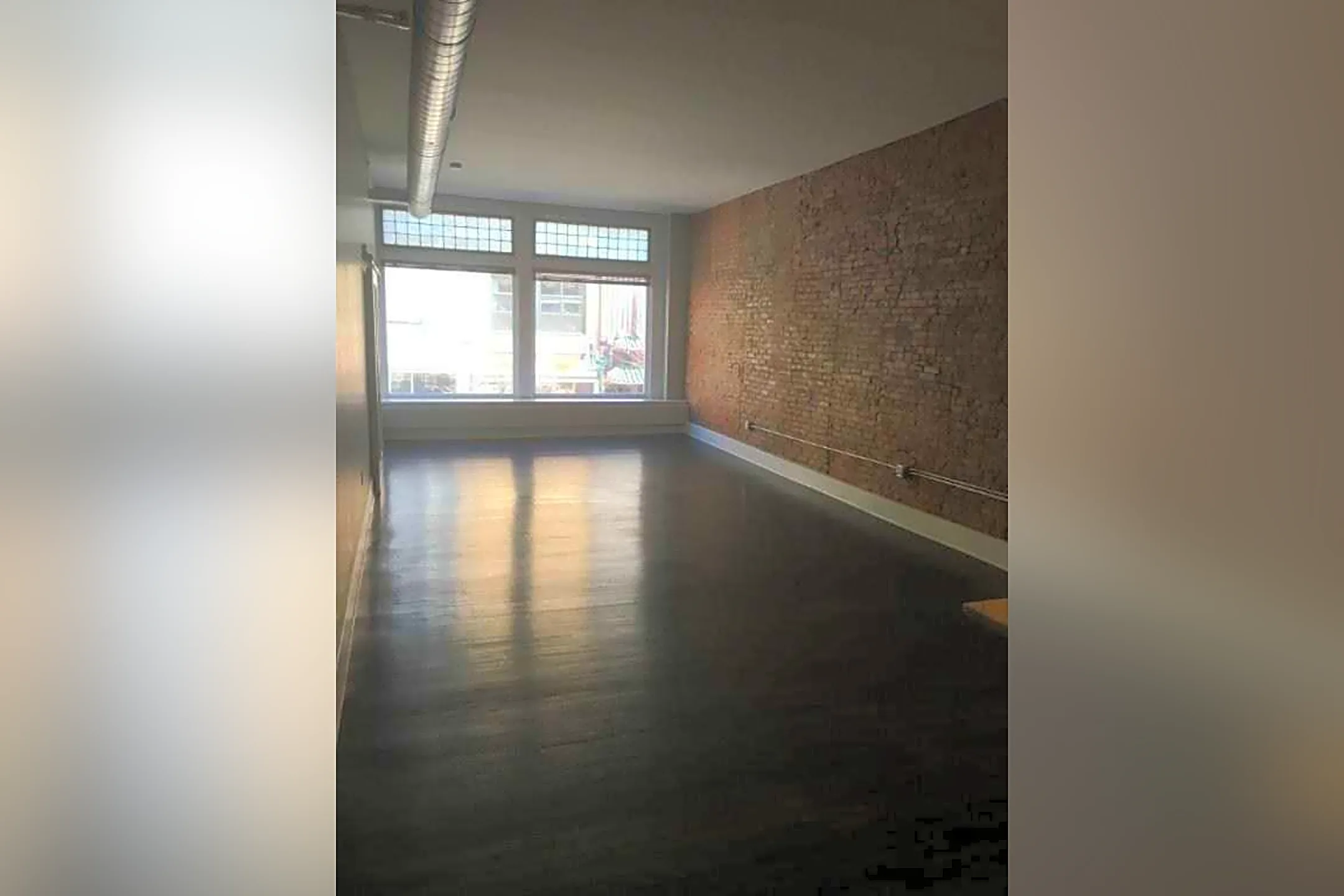 Living Room - Pike Block Apartments - Syracuse, NY