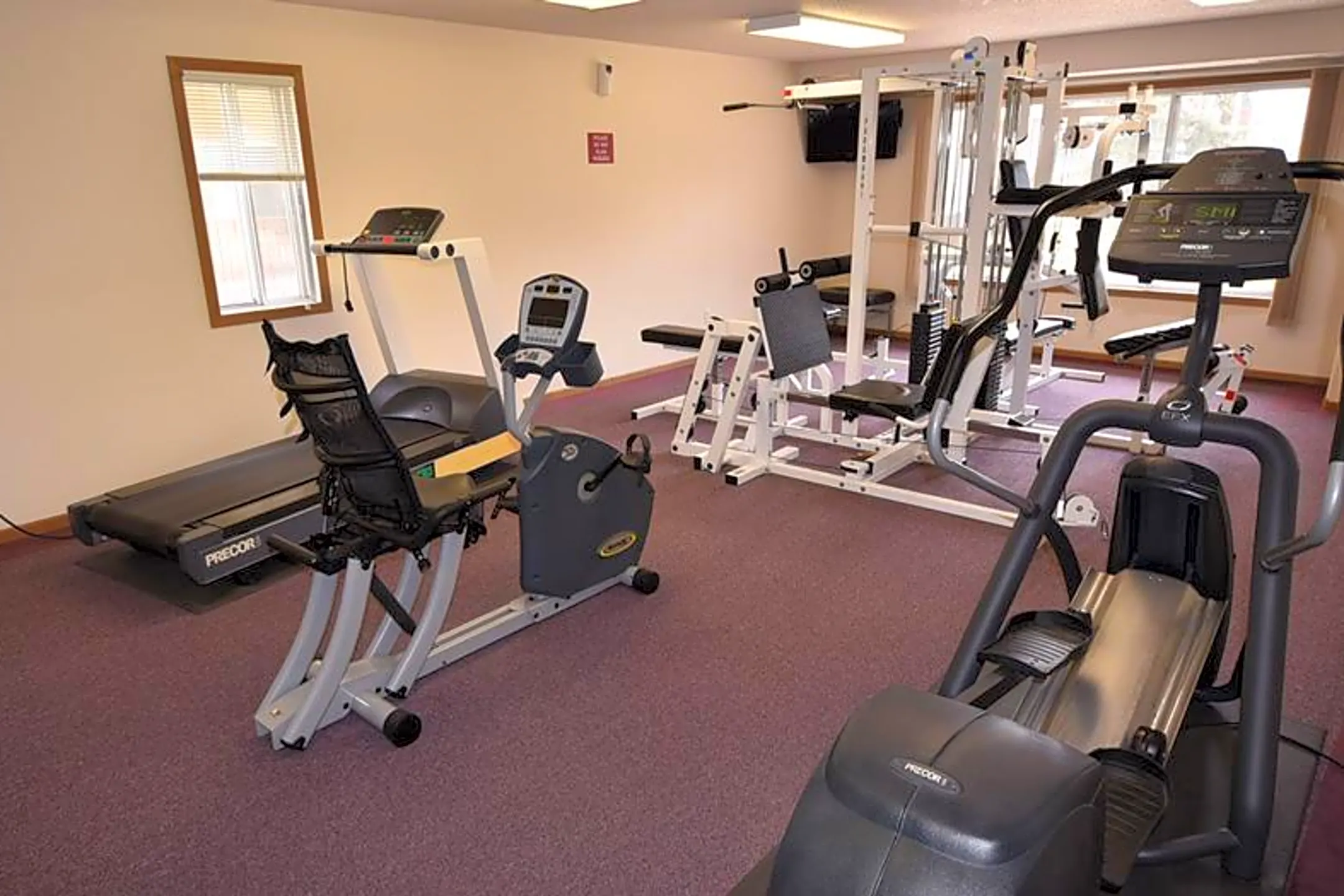 Fitness Weight Room - Sun West I & II Apartment Homes - Fargo, ND