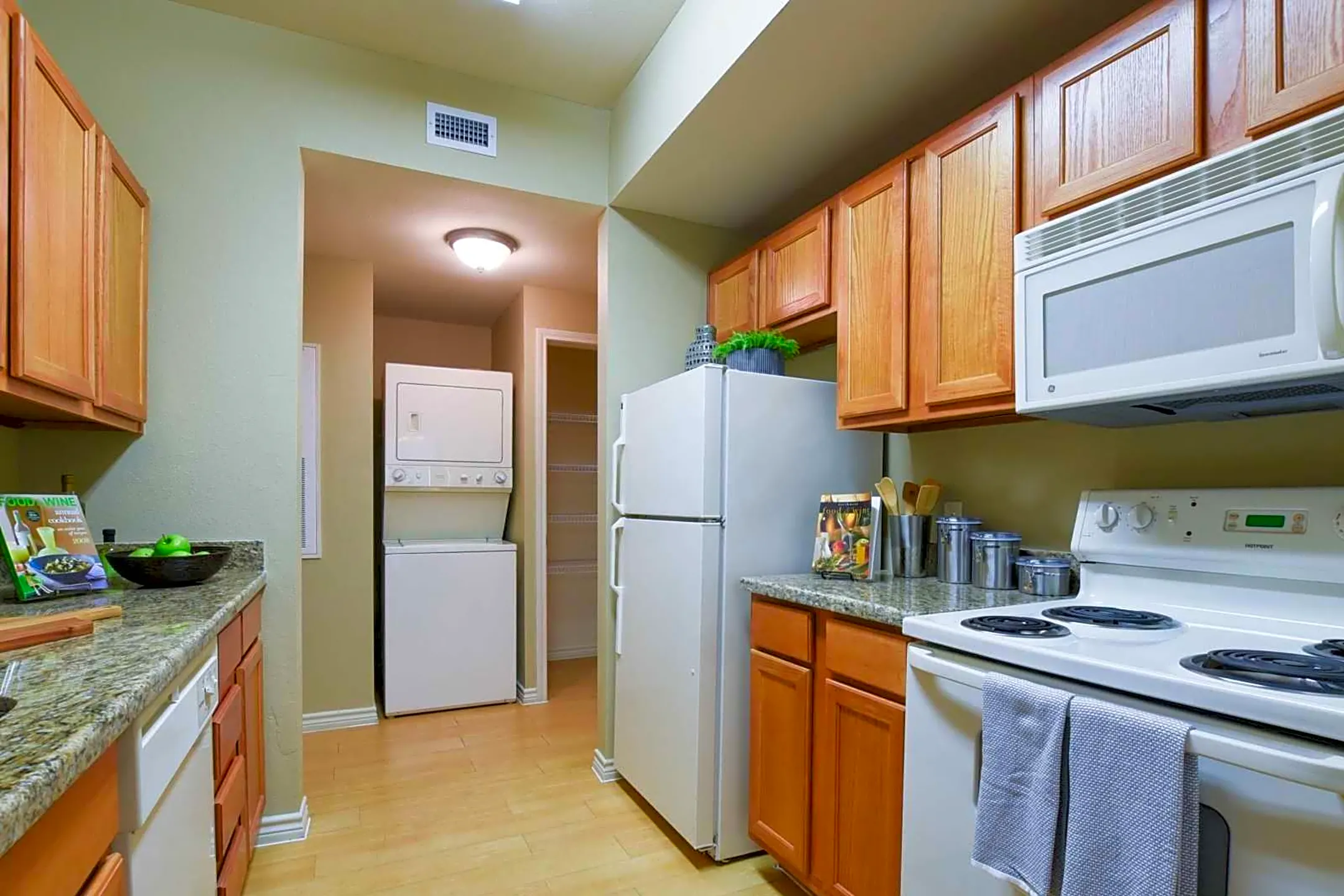 Kitchen - Carmel Apartment Homes - Laredo, TX
