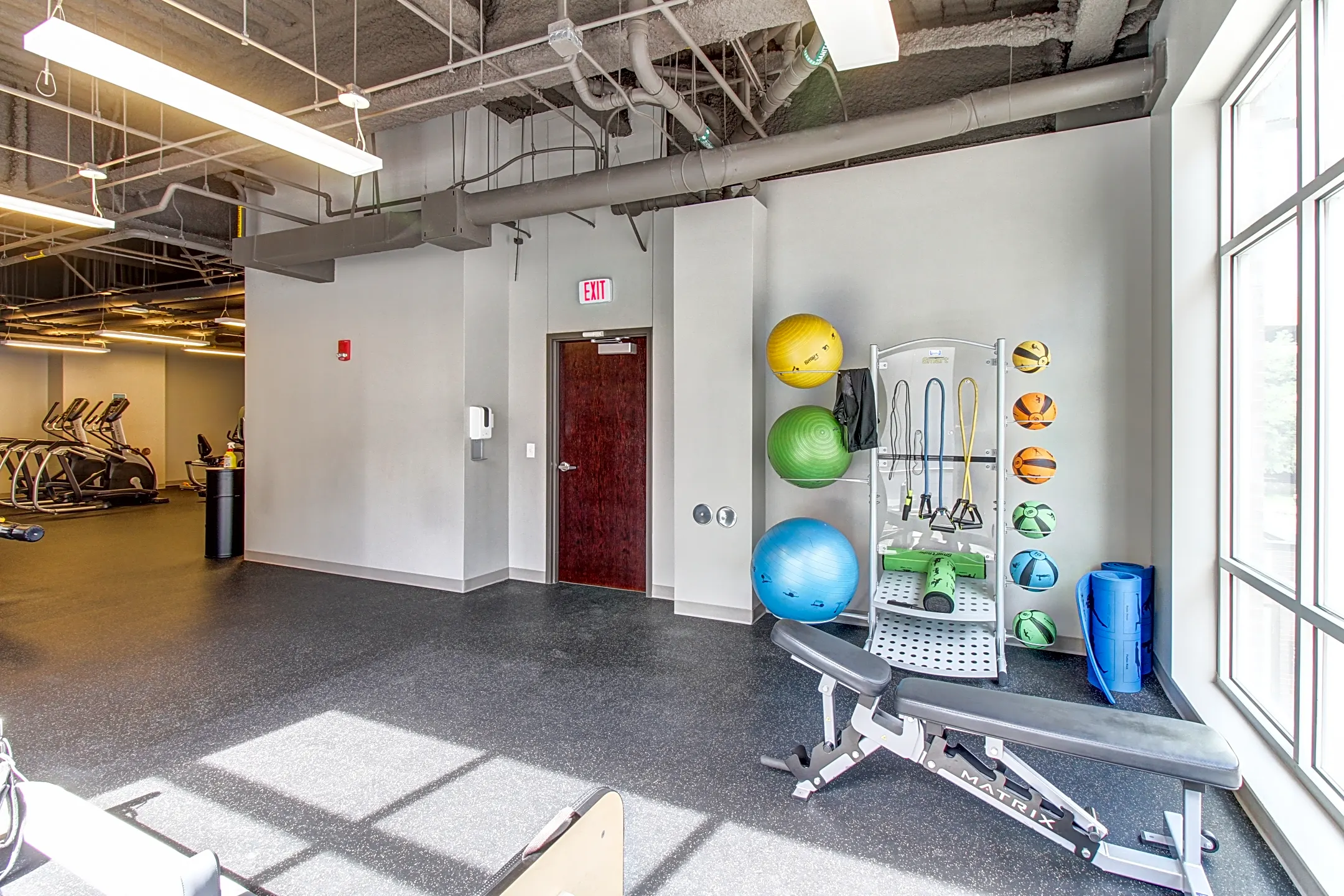 Fitness Weight Room - Capitol District Apartments. - Omaha, NE