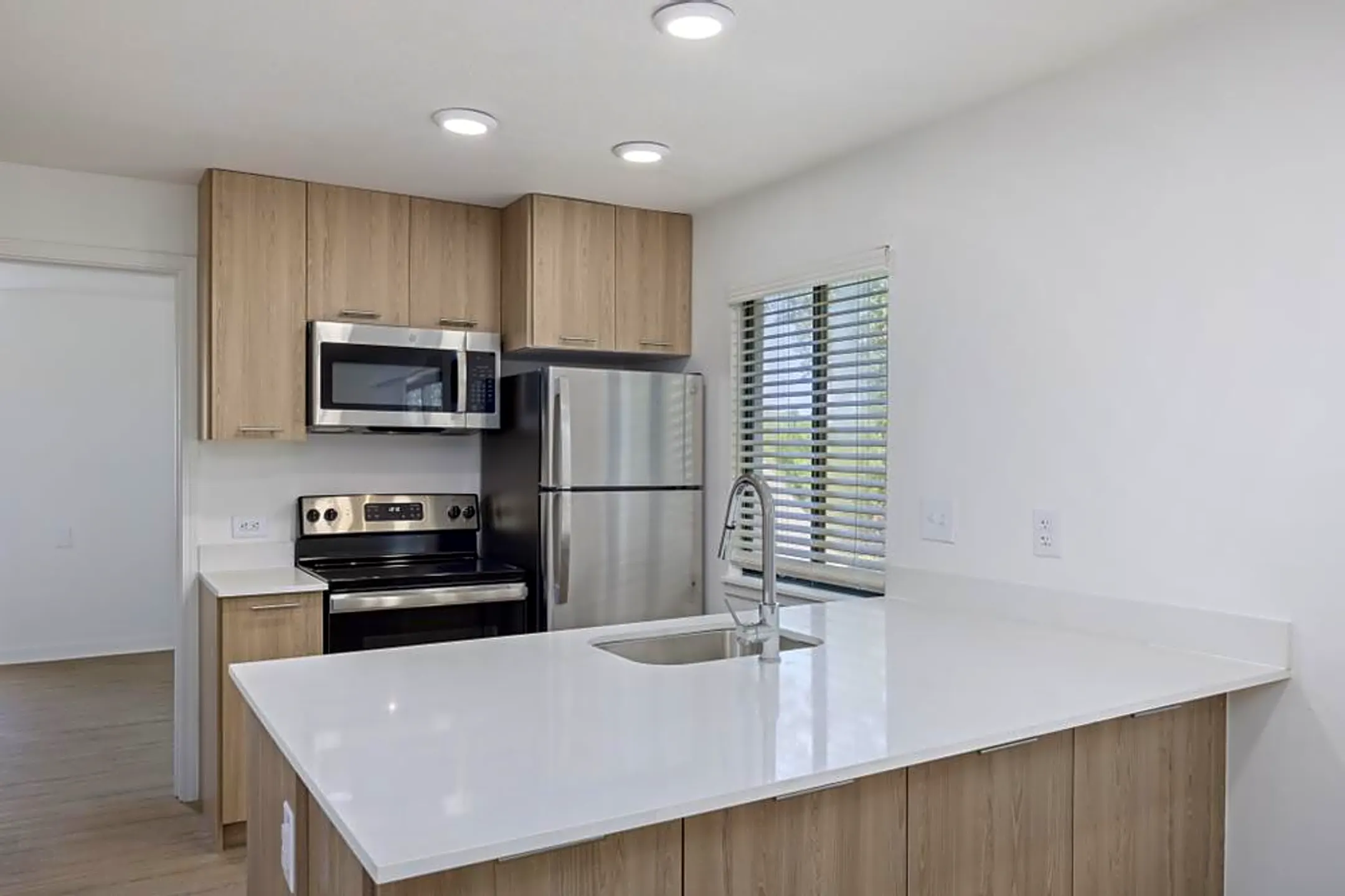 Kitchen - AVIA Apartments At College Boulevard - Overland Park, KS